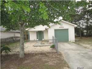Just blocks to the Emerald Green waters of the Gulf of Mexico!!!! This 3 bedroom, 2 bath home is located in quiet and peaceful community of Riviera Beach and within minutes of shopping, restaurants, entertainment and 30-A. Beach home offers carpet throughout, eat-in kitchen, attached garage with laundry area, and screened in back porch. Master bedroom has sliding door to the screened porch. This is a Fannie Mae HomePath property. All information is taken from public records. If important to buyer, please verify.