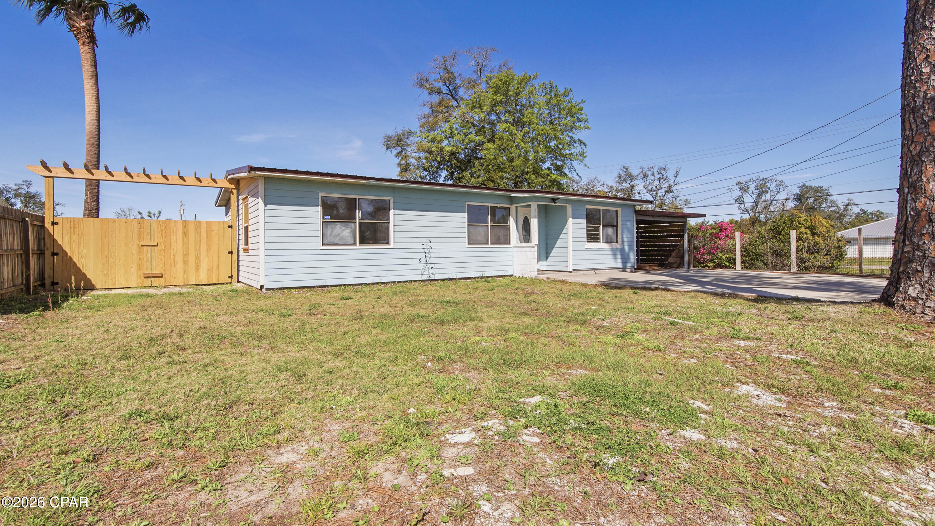 Perfectly located in the historic and highly sought-after St. Andrews area of Panama City, this home puts you just minutes from local restaurants, shops, parks, schools, and the waterfront--making everyday living both convenient and enjoyable. Originally built in 1955 and thoughtfully remodeled in 2016, this property blends timeless character with modern upgrades, all set on a durable concrete block foundation. Inside, you'll find a spacious living room that creates the perfect setting for relaxing or entertaining, along with updated bathrooms featuring tile finishes as well as brand new double-pane windows that improve both comfort and energy efficiency. Major systems have already been taken care of, including an HVAC system and all-metal roof replaced in 2019, as well as a brand new water heater installed at the end of 2025, giving you peace of mind for years to come. Enjoy the separate utility room space, as well as a backyard designed for both privacy and possibility. Concrete block walls provide a secluded feel, while the custom-built back porch offers the perfect spot to unwind and even the potential to be enclosed for additional living space. The property also includes a storage shed/doghouse, adding flexibility for pets, storage, or hobbies. This home is a great opportunity to own a move-in-ready property in one of Panama City's most charming and established neighborhoods, with the upgrades, space, and location that you are looking for.