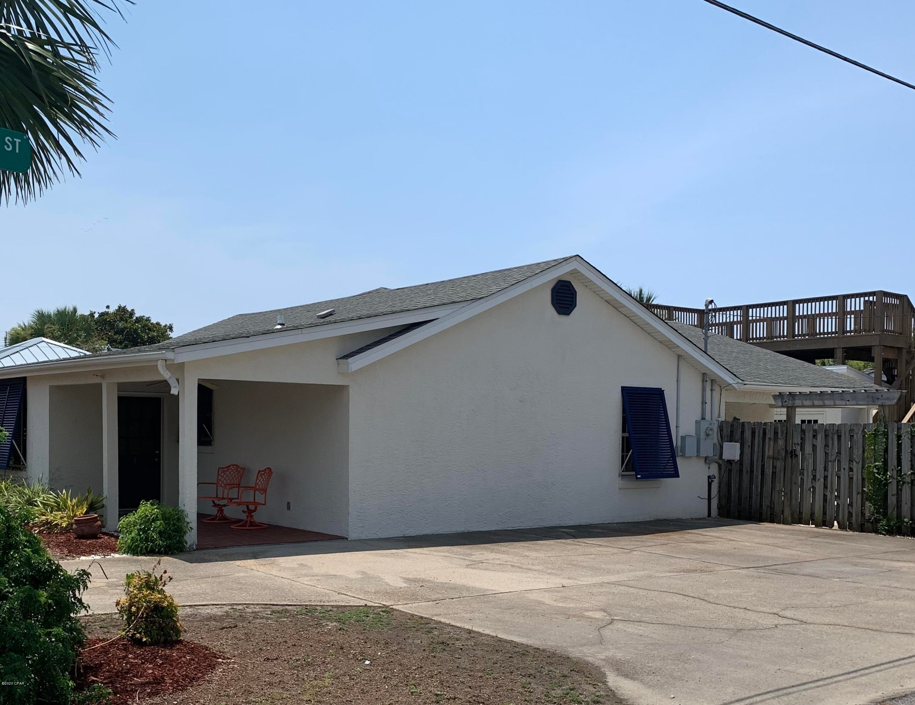 Beautiful, fully furnished, three bedroom two bath home and only 1 block to Bid a Wee Dedicated Beach with private access. Outdoor shower, wonderful private back yard with covered porch, storage building with lots of storage, roof top deck.