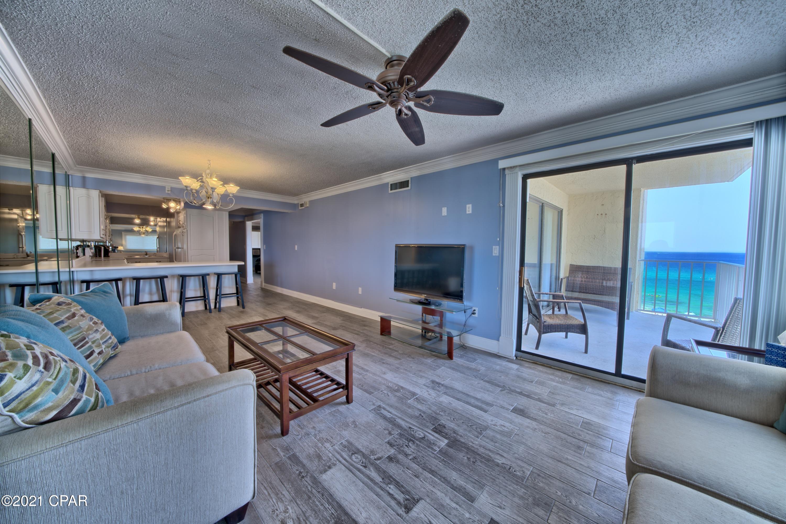 This unit is on the much desired floor and has been expertly decorated and has several upgrades.   The views from this unit are breath taking from the beautiful gulf from views to the views of the lagoon as you walk out the front door. The complex is located on Thomas Drive (a four land street that has just been resurfaced). You are near great restaurants, entertainment, the new sports complex and St Andrews State Park. All information is believed to be correct but should be verified by the Buyer.