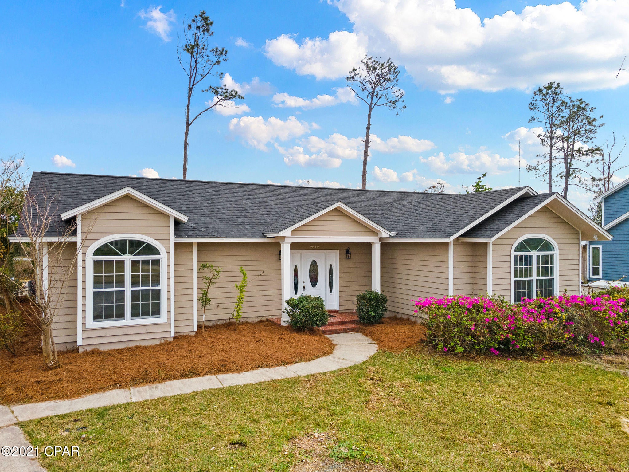 This is it!  The one you have been looking for! This beautiful family home is just waiting for a new family. The huge kitchen with quartz counters and stainless appliances nestled next to the family room that features a gorgeous tiled fireplace. Walk in pantry and additional storage closet off the kitchen. The formal dining room features a wetbar with mini fridge. The great room is truly that...great. French doors off the great room and family room lead to the wrap around covered deck.  The master bedroom has it's own private access to the deck also along with a his and her's bath layout & (most importantly) TWO walk-in closets.  One of the other bedrooms features it's own private bath. The 3rd bedroom has its own access to the hall bath.  Huge grapefruit tree at the end of the driveway, A new sewer line was installed from the house to the city's main so the front yard has been dug up a bit but it has been seeded along with the backyard. Don't delay on this one or you will be disappointed.  
The property is in a flood zone. Seller has an old elevation certificate which will be attached for review but it expired in 2015.