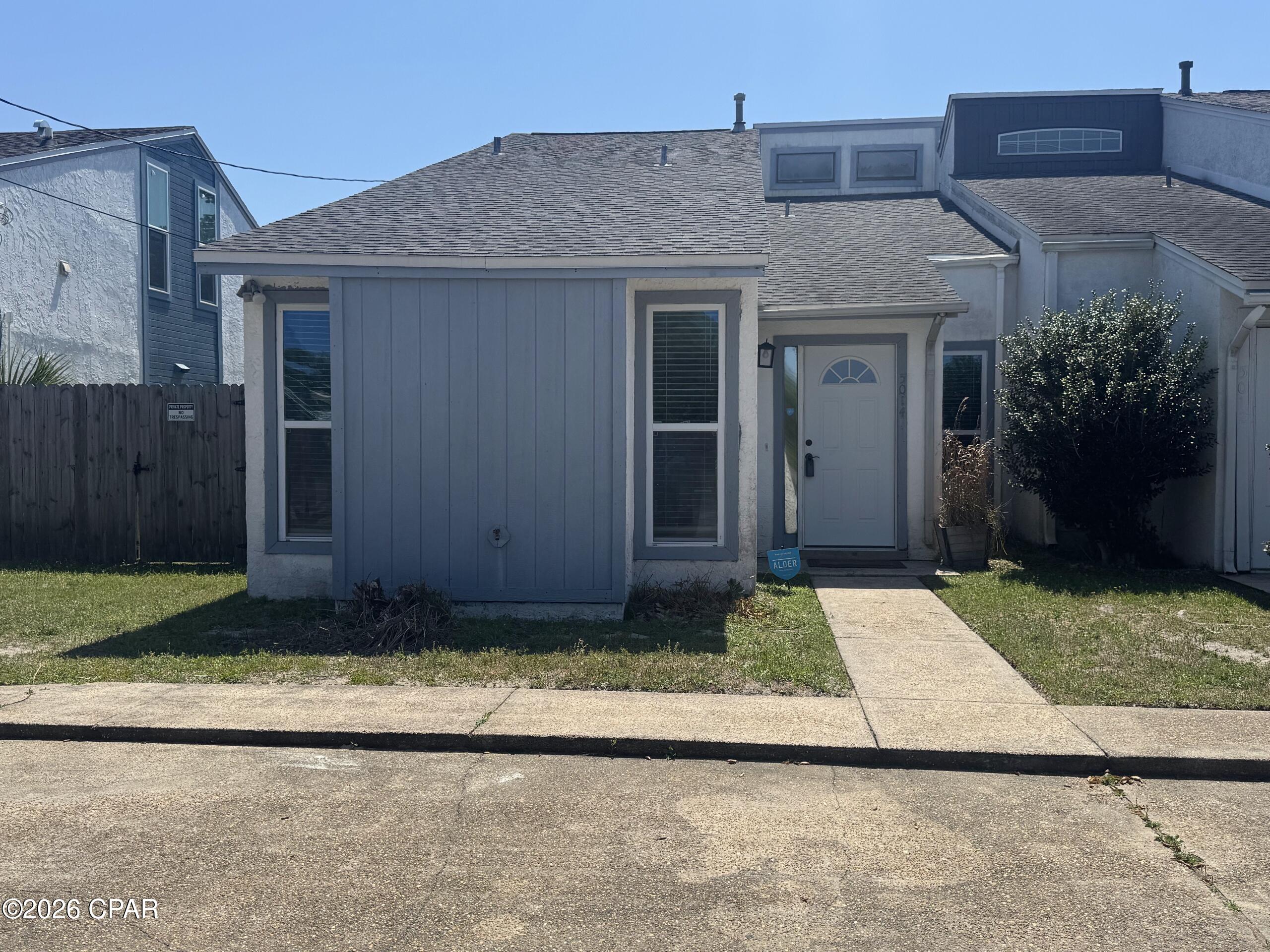 **PRICE REDUCED** OPEN HOUSE August 23rd, 3pm-5pm***  Welcome to this beautifully updated patio townhome in the charming Hickory Park community. This inviting home features durable vinyl plank flooring throughout the living area and bedrooms, creating a modern and cohesive feel.  The spacious primary bedroom and second bedroom are both conveniently located on the first floor. The primary suite includes a private vanity connected to the main bathroom, along with a laundry closet equipped with a full-size washer and dryer.  The updated kitchen showcases a pantry, stainless steel appliances, and a stylish tile mosaic backsplash. It opens seamlessly to the main living area, perfect for everyday living and entertaining. Two sliding glass doors provide abundant natural light and lead to the covered patio--ideal for relaxing or outdoor dining. Upstairs, a bonus loft offers additional flexible living space and includes two storage closets. This area can easily serve as a home office, exercise room, game room, or even a third bedroom. Just beyond the patio, enjoy access to a large courtyard and the community pool, adding to the appeal of this low-maintenance lifestyle.
This would make a great opportunity for a starter home or rental property investment!

This home is conveniently located within 10 minutes of Tyndall Air Force Base and close to shopping, schools, parks, restaurants, and much more! This townhome offers comfort, functionality, and an excellent location.