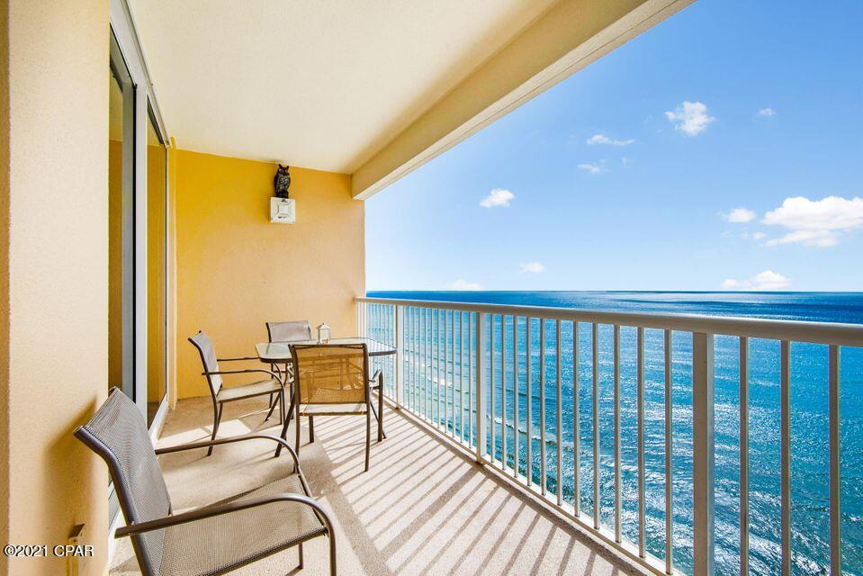 The best has arrived! This stunning Gulf Front 3 bedroom condo has been remodeled and is one your friends, family and vacationing guests will enjoy for a lifetime. NO CARPET! Brand New Luxury Vinyl! Enjoy endless panoramic views from your oversized and private balcony. The kitchen boasts white shaker cabinets, a kitchen island, stainless steel appliances, pantry, endless countertops and amazing views of the PCB coastline. Sold Fully Furnished. Living room showcases gorgeous furniture and a wetbar. The Gulf Front Master suite hosts a private entrance to the balcony. A Short-Term rental machine boasting an amazing income producing history. You'll never want to leave the Resort - Sit and enjoy FIVE pools (2 indoor, 2 outdoor and 1 kid's pool), Tennis courts, In-house Starbucks, Arcade, + more