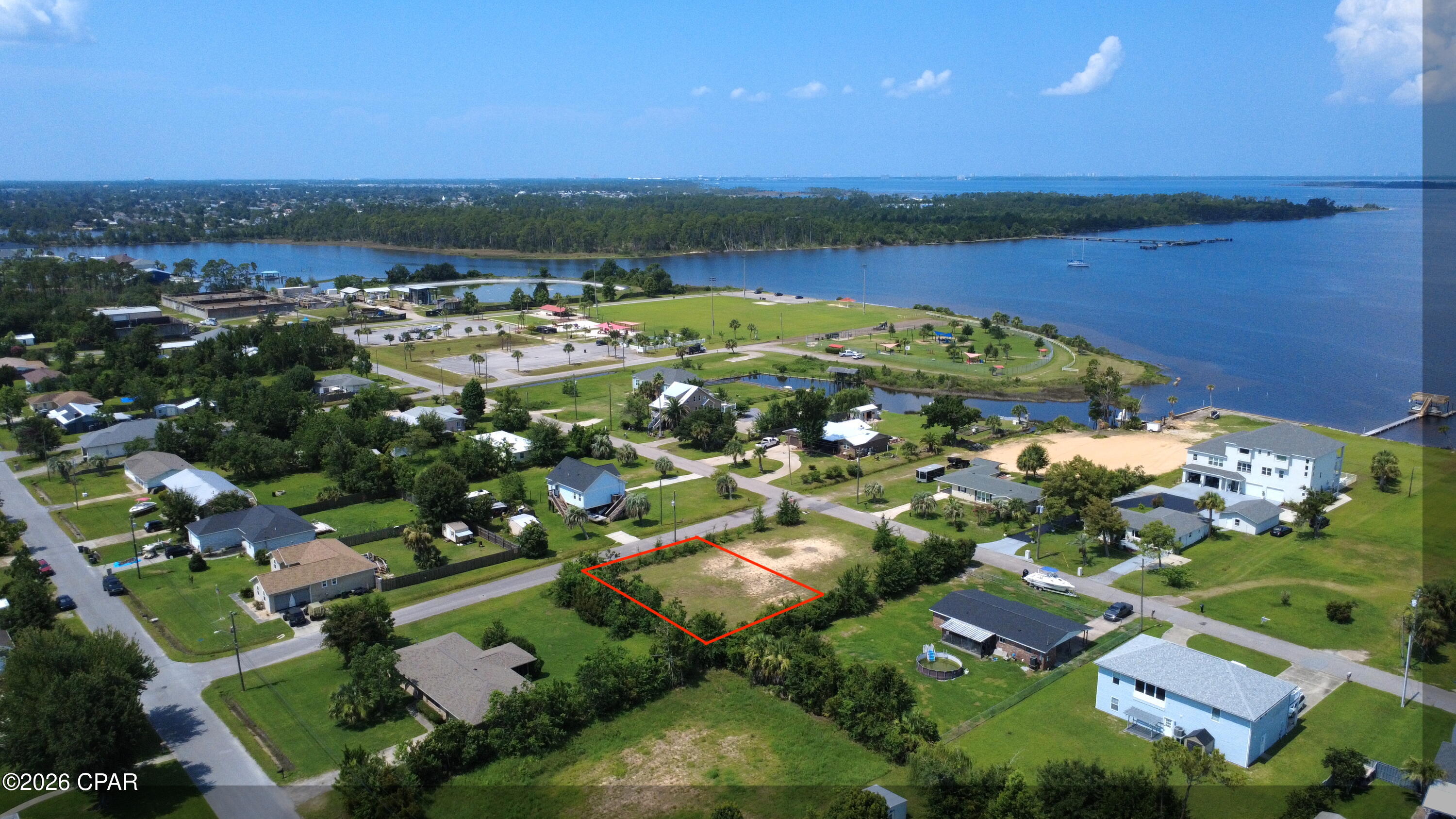 Discover the perfect opportunity to build your dream home in the heart of Lynn Haven! This exceptional homesite offers the ideal blend of convenience, charm, and future potential. Located in an established neighborhood, you'll enjoy being just one block from A.L. Kinsaul Park and the popular Bark Park (Dog Park), providing easy access to walking paths, playgrounds, green space, and a dedicated area for your four-legged family members.

The property is also just minutes from top-rated schools, shopping, restaurants, and all the everyday conveniences Lynn Haven has to offer.

Whether you're planning to build your forever home or looking for an investment in one of Bay County's most desirable and rapidly growing communities, this lot is an outstanding opportunity. Enjoy the welcoming small-town atmosphere of Lynn Haven while remaining just a short drive from local marinas, parks, and the beautiful white-sand beaches of Florida's Gulf Coast.

Don't miss your chance to own a homesite in one of Bay County's fastest-growing and most sought-after communities!