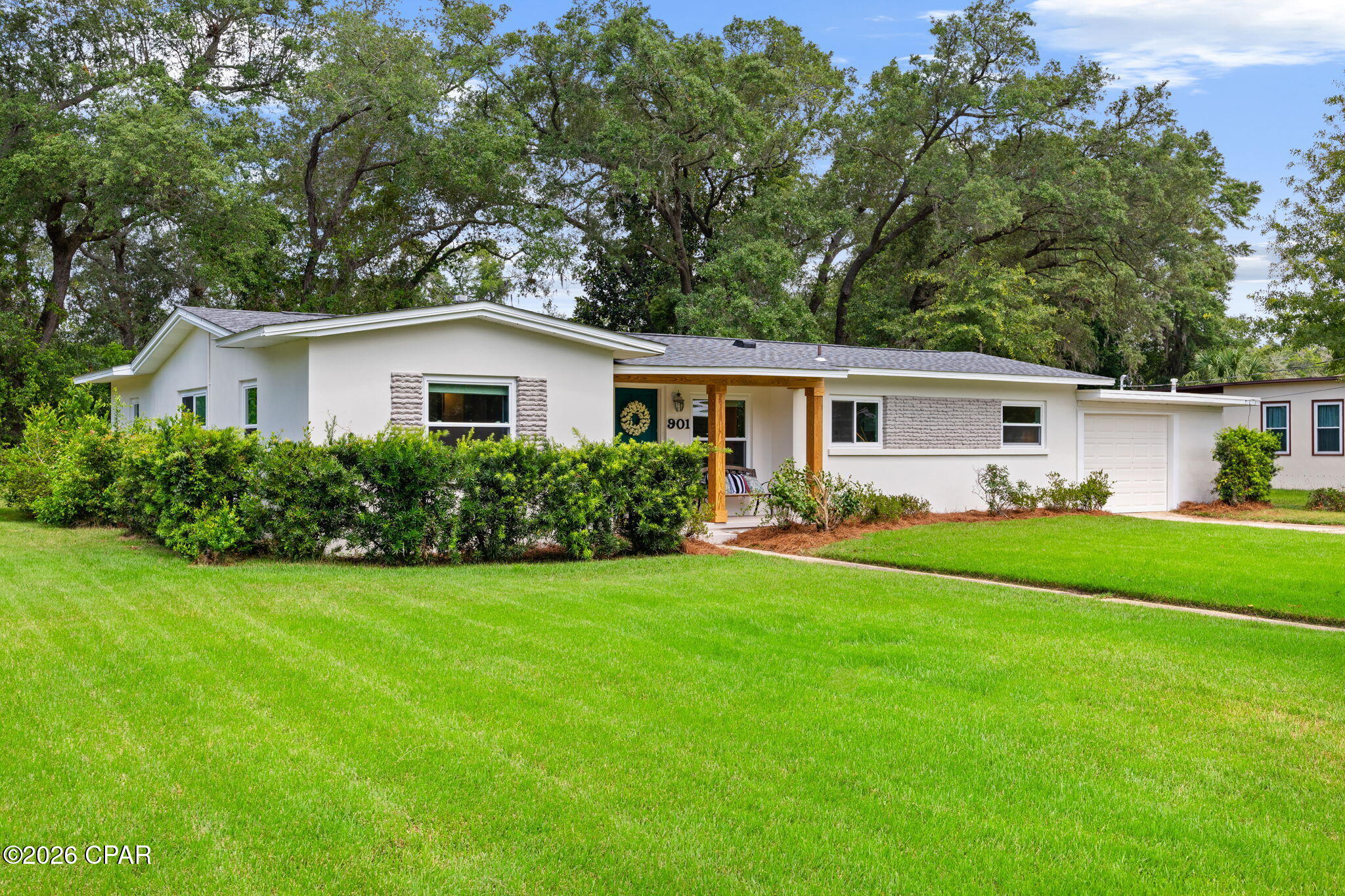 Welcome to your new home! This beautifully updated older home exudes charm while offering modern conveniences. Nestled just one block back from the iconic historical Beach Drive in Panama City, this property boasts a remarkably large yard surrounded by lush greenery, providing a serene escape right at your doorstep with views of the bay! This home is perfectly situated between St. Andrews and Downtown Panama City...making your options for shopping, entertainment, dining and more endless! 

Step inside to discover a thoughtfully updated interior that retains its original character. The spacious layout features a generous flex space that can serve as an office, an extra living room, or a bedroom, adapting to your lifestyle needs. Additionally, the plumbing, AC, roof and windows have all been updated ensuring peace of mind for years to come! 

Enjoy the perfect blend of vintage charm and contemporary living in a location that captures the essence of coastal life. Don't miss the opportunity to make this enchanting home yours!