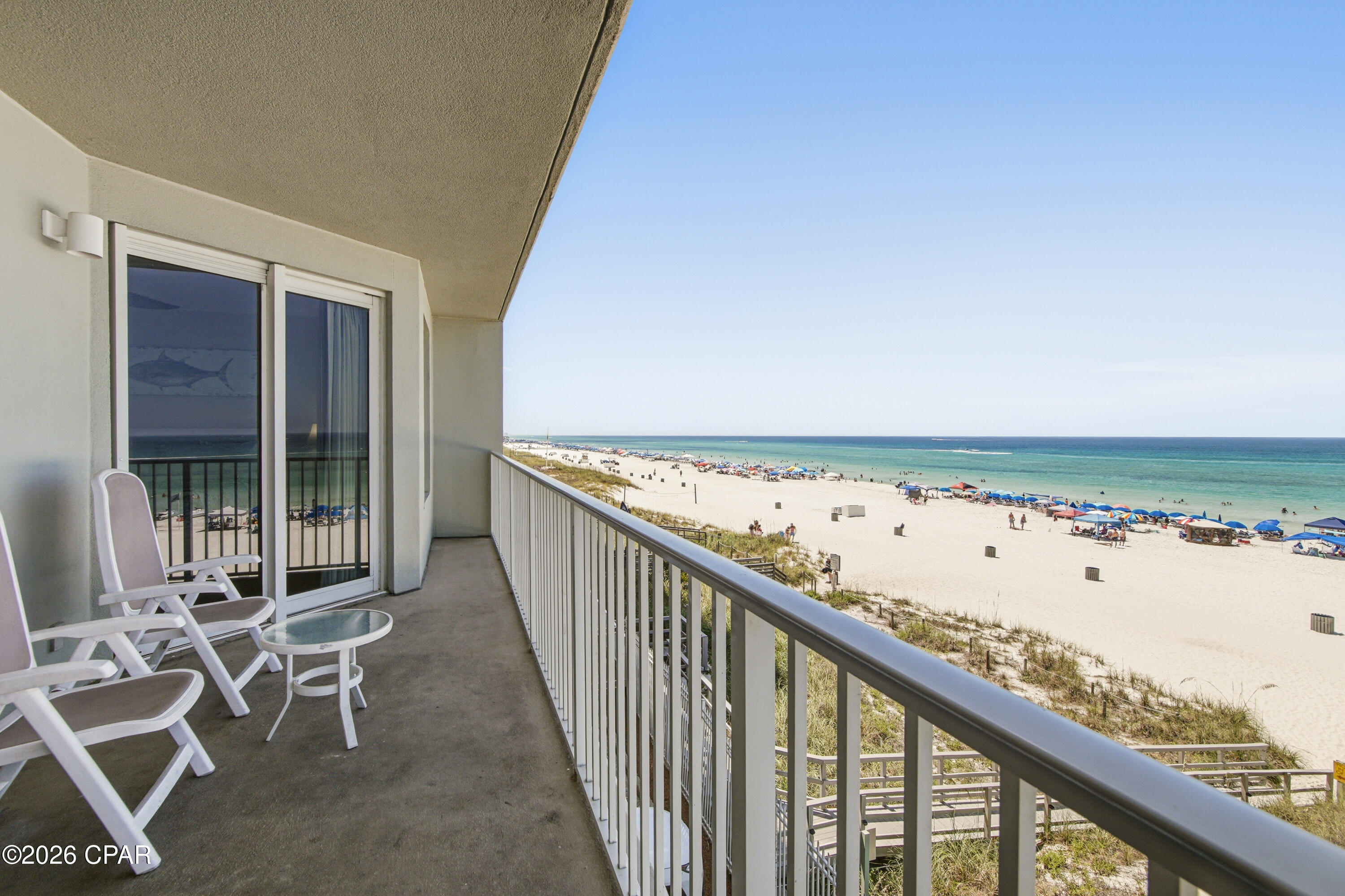 Wake up to breathtaking Gulf views and end every day with unforgettable sunsets from this beautifully positioned beachfront condo at Marisol. Whether you're searching for a luxury vacation retreat, second home, or a proven short-term rental investment, this property checks every box with exceptional income-producing potential in one of Panama City Beach's most desirable Gulf-front locations.

Floor-to-ceiling windows and a spacious private balcony showcase panoramic emerald-green waters and sugar-white sand, creating the perfect setting to relax or entertain. Inside, the open-concept floor plan is designed to maximize the stunning waterfront views while providing plenty of space for family and guests.

Marisol is a low-density Gulf-front community offering owners and guests resort-style amenities including a beachfront pool, hot tub, fitness center, covered parking, and direct beach access, providing a more private and relaxing atmosphere than many of the area's larger resorts.

Perfectly located in the heart of Panama City Beach, you're just minutes from countless restaurants, beachfront entertainment, shopping, golf courses, water sports, and local attractions. Spend the day at Pier Park, take a trip to Shell Island, explore St. Andrews State Park, enjoy fishing charters from nearby marinas, or experience family favorites like Shipwreck Island Waterpark and Gulf World Marine Park. Everything that makes Panama City Beach one of Florida's premier vacation destinations is right at your doorstep.

With spectacular waterfront views, strong vacation rental appeal, outstanding amenities, and an unbeatable location, this is a rare opportunity to own a Gulf-front property that offers both an incredible lifestyle and excellent investment potential.
