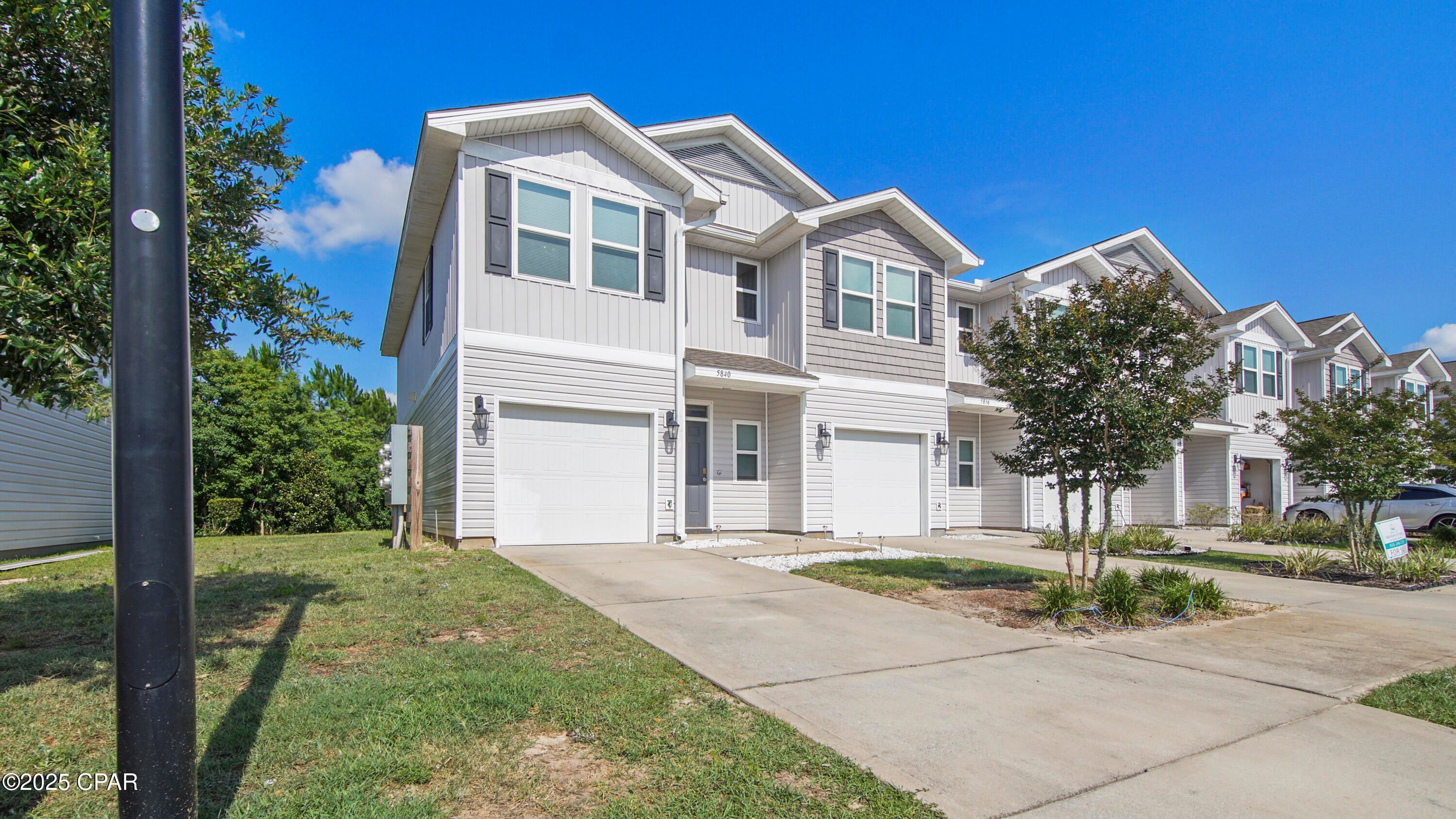 This newer 3-bedroom, 2.5-bath, end unit townhome is just 10 minutes from Tyndall Air Force Base and is pet friendly. Rent includes trash and yard care. A washer and dryer is also included! Perfectly situated within walking distance to Walmart, restaurants, shopping, and more. Enjoy all the conveniences right at your doorstep! The community features a pool, sun decks, and extra guest parking. Inside, you'll find a nice kitchen with a pantry, a large living room, and a convenient half bath downstairs. Upstairs hosts all three bedrooms, a full bath, and the laundry area. The spacious master suite boasts a huge walk-in closet and a nice master bath. Step out to the back patio and enjoy the wooded view and no houses behind you! The community also offers sidewalks, green spaces for pet walks, and a community pool!