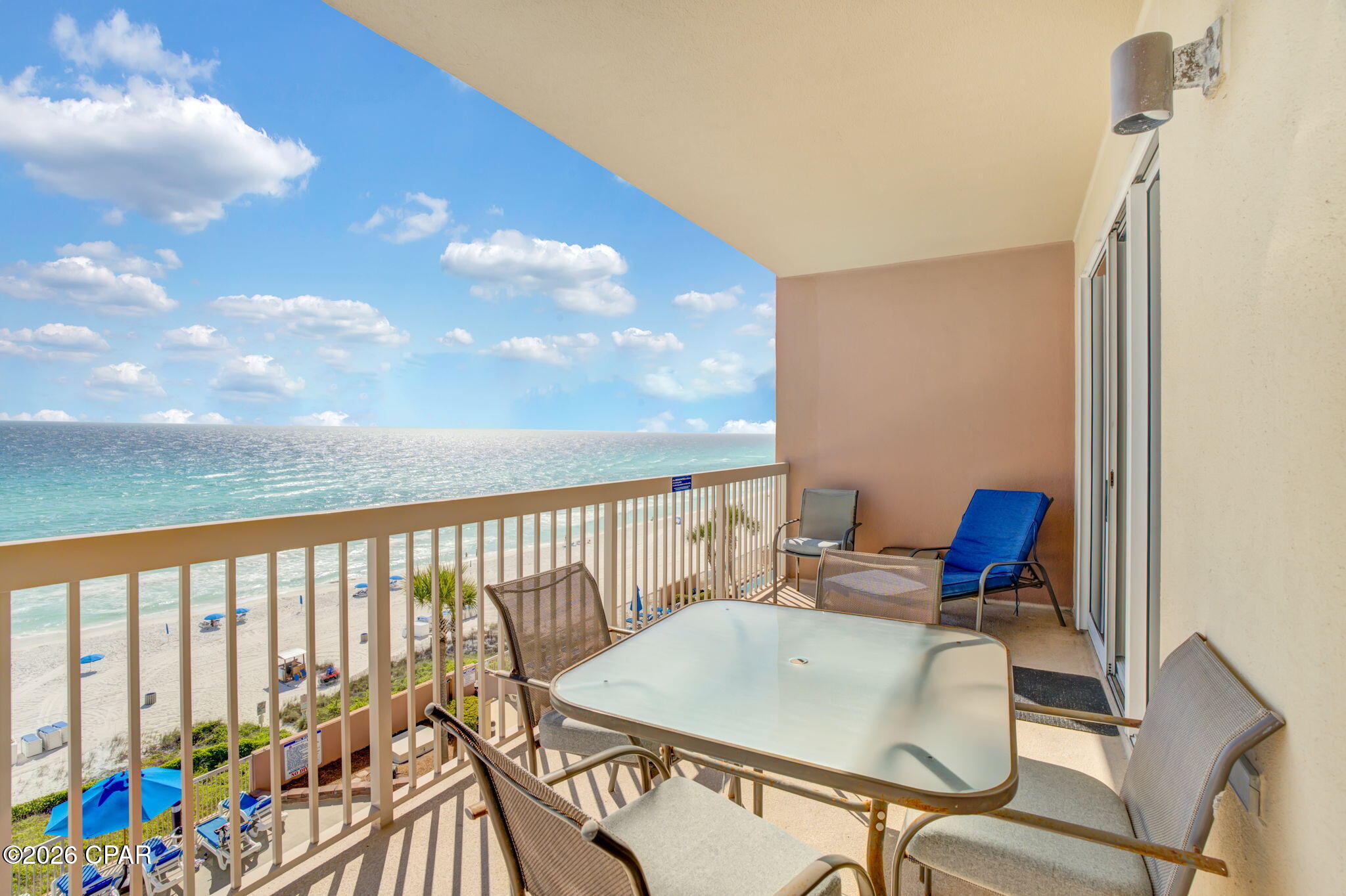 Living directly on the beach doesn't get better than this. Sunrise Beach Unit 803 sits right on the water with floor-to-ceiling views of the Gulf from both the living room and master suite -- emerald water, sugar-white sand, and front-row sunsets from your oversized private balcony. High ceilings, decor and tile throughout keep it cool and coastal. The layout is the real selling point: two full bedrooms, two full baths, plus a dedicated bunkroom enabling the unit to sleep 8 comfortably. It lives and rents like a 3-bedroom, which shows in the numbers -- peak nights fetch $400+, and the calendar is largely booked for the season. A separately deeded storage unit (valued at $15K) conveys with the sale -- a rare perk in this building. Everything's been refreshed in the last four years: HVAC, stove, microwave, dishwasher, lighting, paint, and décor. It's truly turnkey -- no honeydew list, no off-season projects. Whether you're buying for the rental income or planning to actually use it, Unit 803 makes both cases easily.