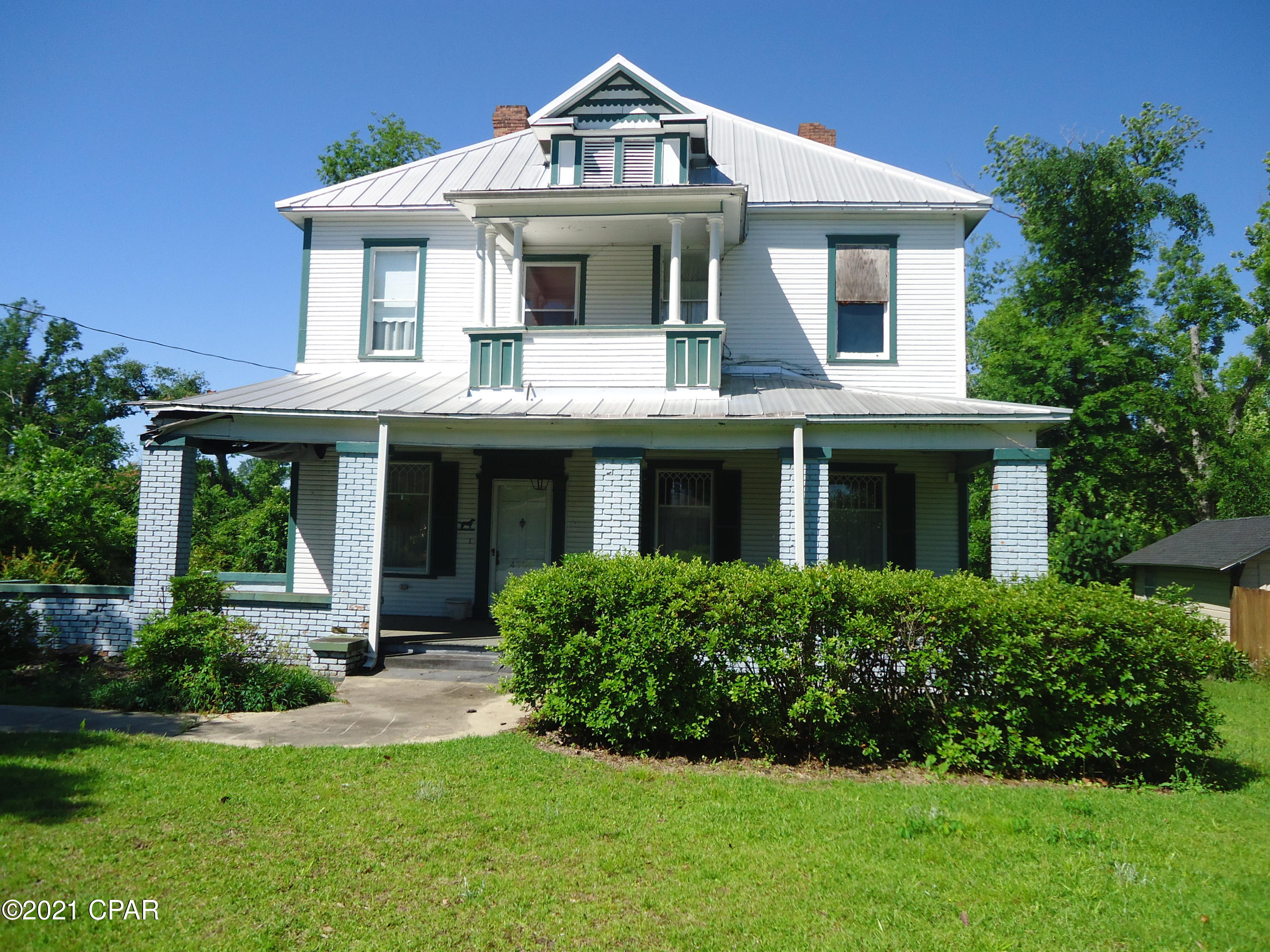 UNDER CONTRACT,  TAKING BACKUP OFFERS. The time is now and the price is right for this charming southern classic.  Built in 1905 with some Hurricane Michael Damage it is ready to be brought back to the glory days of old homes, old trees and great friends.  Easy walk to downtown or with city approval you can turn it into your very own bed and breakfast.