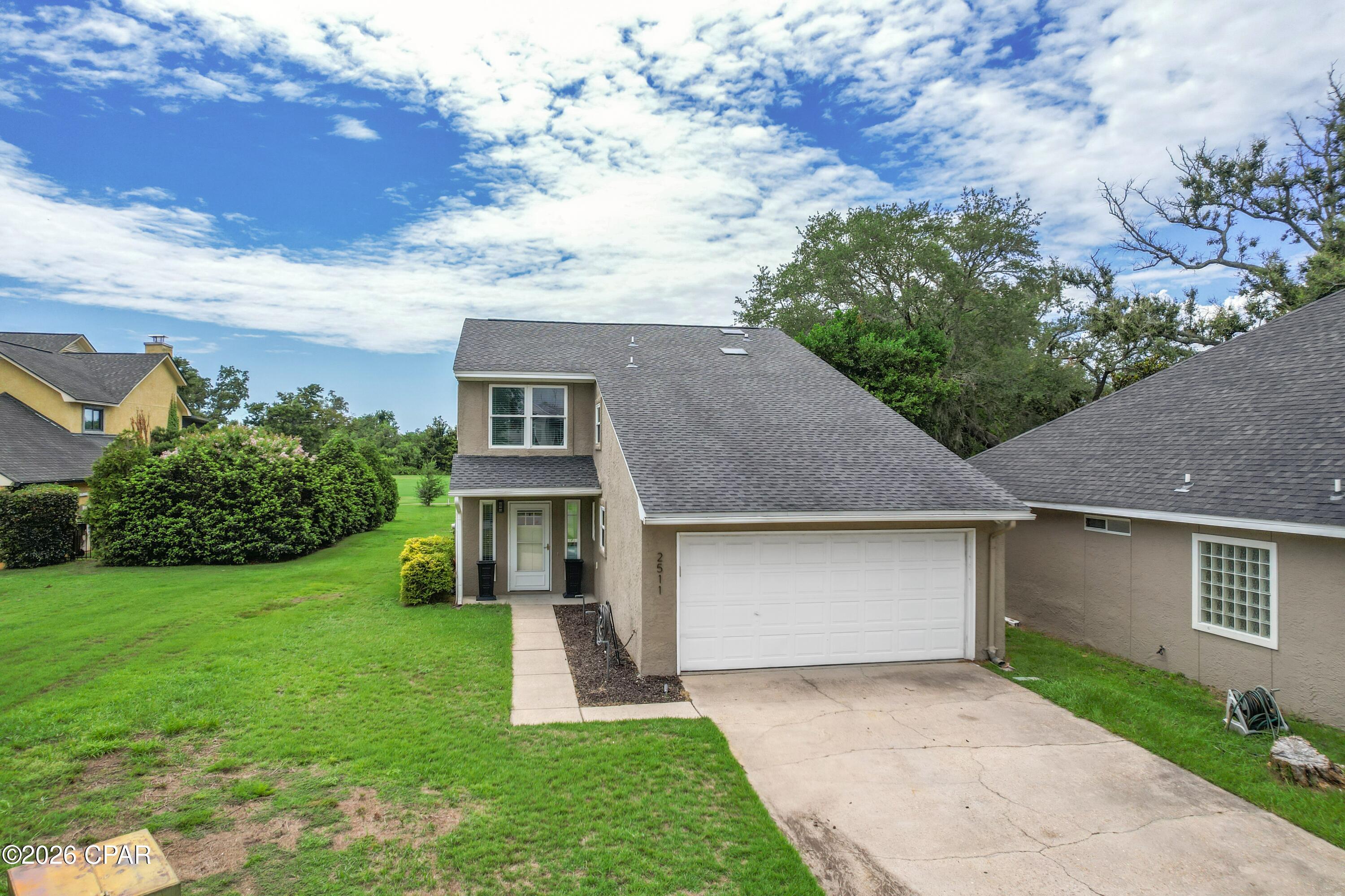 Nestled in the heart of the highly sought-after Panama Country Club, this beautifully updated 4-bedroom, 2.5-bath home offers the perfect blend of luxury, functionality, and location. Situated on the 6th fairway, the backyard opens to the community playground and expansive green space where neighbors gather for seasonal events and family activities.
Inside, thoughtful upgrades and custom details set this home apart. Gorgeous luxury vinyl plank flooring flows throughout the main living areas, complemented by beautifully updated tile showers and a stunning stone fireplace that serves as the focal point of the living room. Hidden bookshelf doors add a touch of character and charm, while the space beneath the staircase has been expertly transformed into a custom-built home office and dog kennel, maximizing both style and functionality.
Designed for comfortable everyday living and effortless entertaining, this home offers spacious bedrooms, inviting living spaces, and countless custom touches throughout. Whether you're relaxing by the fireplace, enjoying the golf course views, or taking advantage of the neighborhood's playground and community events just steps away, this exceptional home offers a lifestyle that's hard to match.
Don't miss your opportunity to own this one-of-a-kind home in one of Bay County's most desirable golf course communities!
