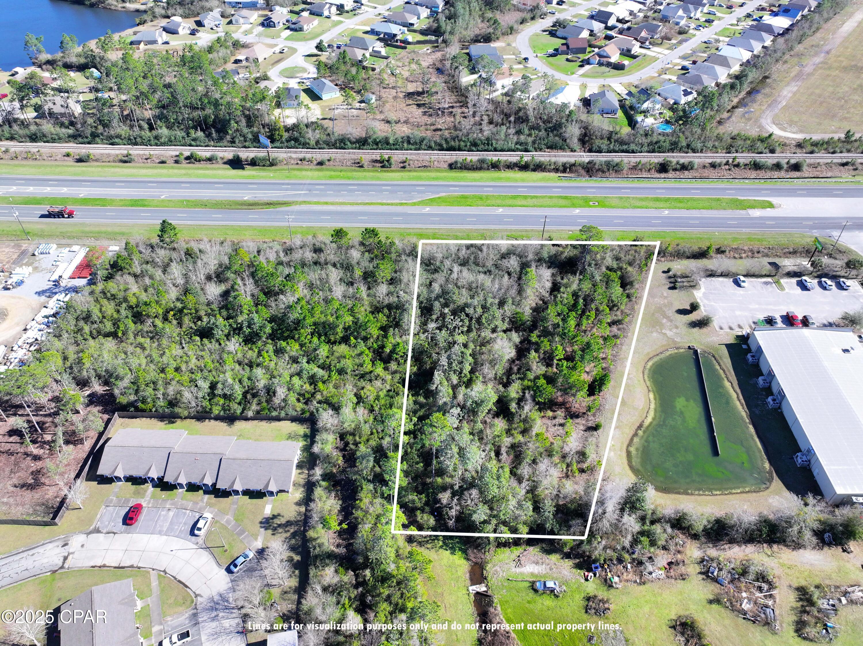 Discover the ideal setting for your next business venture on HWY 231, where an impressive 29,500 vehicles travel daily, according to the 2024AADT. Property photos provide a quick visual reference for these substantial traffic counts, highlighting the exceptional visibility and exposure available. With over 1.3 acres of prime commercial real estate, this location offers outstanding advertising potential along a bustling highway and is adjacent to a popular general store, further attracting public attention. Zoned C-3, this property is suitable for a wide range of uses, including retail centers, shopping plazas, big box stores, self-storage facilities, auto dealerships, restaurants (with drive-thru options), hotels, office buildings, and certain light commercial services. Reach out to your preferred Realtor today to learn more about this versatile commercial opportunity. Some photos have been virtually staged or edited by AI.