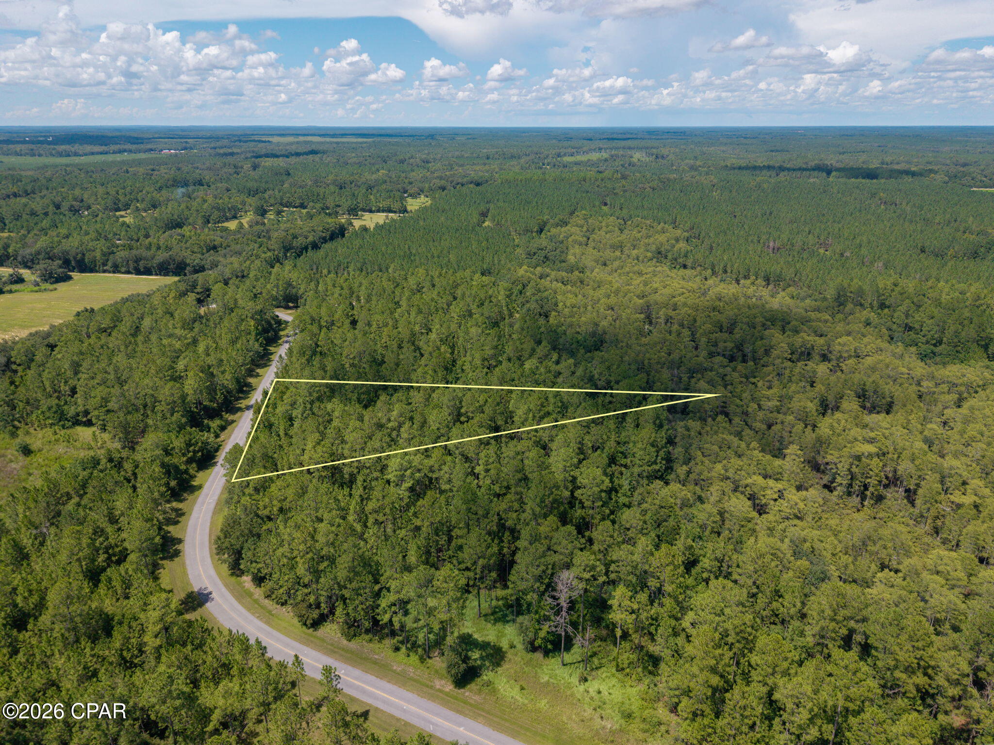 If you've been searching for the right piece of land to build your dream home, this 2.24+/- acre homesite in Cypress Crossing deserves a closer look! Tucked among mature trees in a beautiful gated community, this wooded property offers the space and natural setting that can be hard to find in a traditional subdivision. The property has already been surveyed, providing a great starting point as you begin planning your future homesite. With over two acres to work with, you can create a homesite that feels tucked away while still enjoying the appeal of an established community. Keep the trees you love for added privacy and shade, carve out the perfect spot for your home, and enjoy a peaceful setting surrounded by the natural beauty of Northwest Florida. Paved road frontage provides convenient access, while the attractive gated entrance adds to the welcoming feel of Cypress Crossing. Located in Washington County, this property is an excellent opportunity for anyone looking for more land, more privacy, and a place to build a home designed around the lifestyle they want. Bring your plans and start imagining what you could create here!