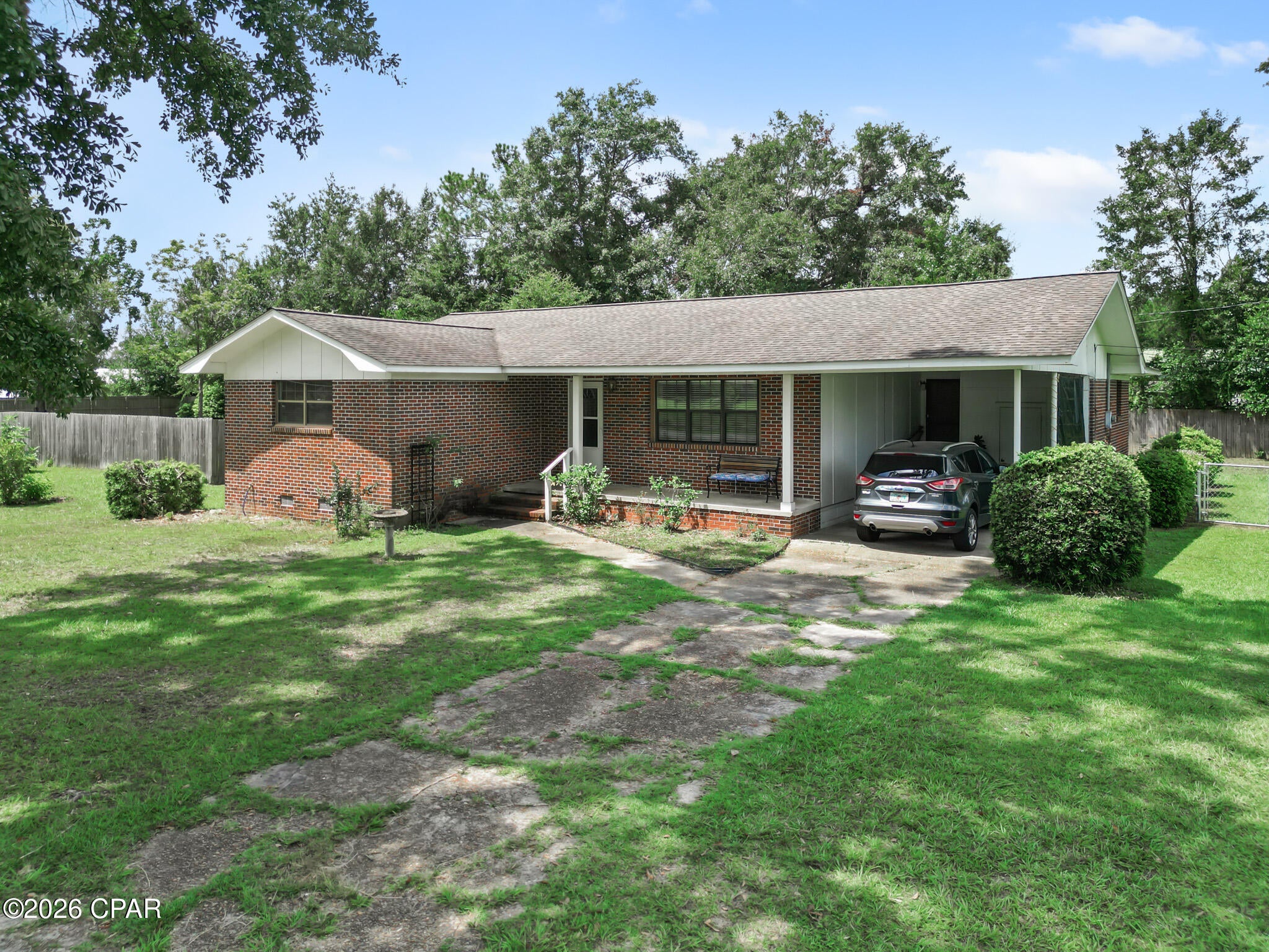 CURRENTLY UNDER CONTRACT, SELLER WILL CONSIDER BACKUP OFFERS

Looking for more room, a useful backyard, and everyday convenience in Blountstown, Florida? Welcome to 16478 SW Mimosa Street! This 3 bedroom, 1.5 bath home offers approximately 1,498 square feet of comfortable living space on approximately 0.34 acres.

The Florida room provides flexible space for relaxing, hobbies, or gathering with friends. Open the sliding glass door and step directly into the fenced backyard, where there is room to cook out, play, garden, or simply enjoy the outdoors. A storage shed with a roll up door makes it easy to store lawn equipment, tools, and outdoor gear. The one car carport adds convenient covered parking.

Local restaurants are within walking distance, while Panama City is approximately one hour away and Dothan, Alabama, is about one hour and 20 minutes away. Both cities offer additional options for shopping, dining, healthcare, and employment.

If you have been searching for a home with added living space, practical storage, and small town convenience, this Mimosa Street property deserves a closer look.