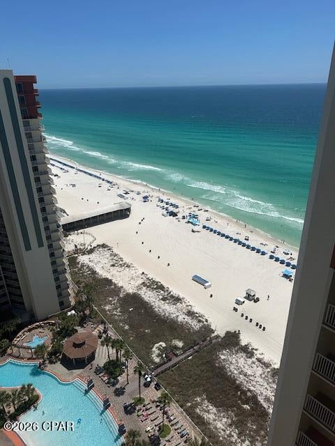 Own at the Shores of Panama with this highly sought-after ''G'' stack Gulf-view studio condo, a prime penthouse level TOP FLOOR location offering breathtaking, unobstructed views of the emerald waters and sugar-white sand. 
Wake each morning to panoramic Gulf views and step onto your private balcony overlooking the shoreline. The condo conveys fully furnished and rental-ready, making it an effortless investment opportunity or turnkey beach retreat. This unit also includes one deeded parking space. Shores of Panama is home to the largest Gulf-front lagoon pool in Panama City Beach, with its spectacular 14,000+ sq ft zero-entry lagoon pool with palm-lined islands, fountains, and expansive hot tub. tropical palm islands, fountains, and an oversized hot tub--all just steps from exclusive beachfront access. Owners and guests also enjoy: Indoor heated pool and hot tub, 24-hour fitness center, Seasonal poolside Tiki bar, Covered parking, and On-site security. The location is unbeatable--walk next door to Pineapple Willy's for beachfront dining or cross the street to Laketown Wharf for multiple dining options including The Wharf Buffet, Juan Taco, and LuLu's Bar & Restaurant. Shopping, entertainment, and attractions are all within easy reach. If you're looking for a well-positioned Gulf-front condo with proven rental appeal and unbeatable amenities--this is a standout opportunity. With exterior renovations scheduled to enhance curb appeal and long-term value, this is a strategic opportunity to secure this wonderful gulf front studio condo, ideal as a personal retreat, income powerhouse, or both. All information and HOA details are believed accurate but should be verified by buyers if important.