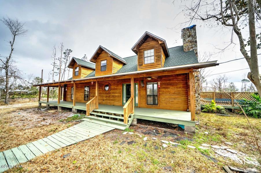 LEASE TO OWN OPTION!!! Want to feel like you are away from it all, yet still so close to everything? This is an absolutely beautiful, custom built home. It has so many unique features, such as copper countertops, newer appliances including a convection oven, built in microwave, 5 burner gas stove, 2 pantries and plenty of cabinet space. The first floor Master Suite has a Jacuzzi tub, Large walk in closets. This home features a Wrap around porch, Parking for RV or Boat and Covered outdoor patio. 

Above ground pool.