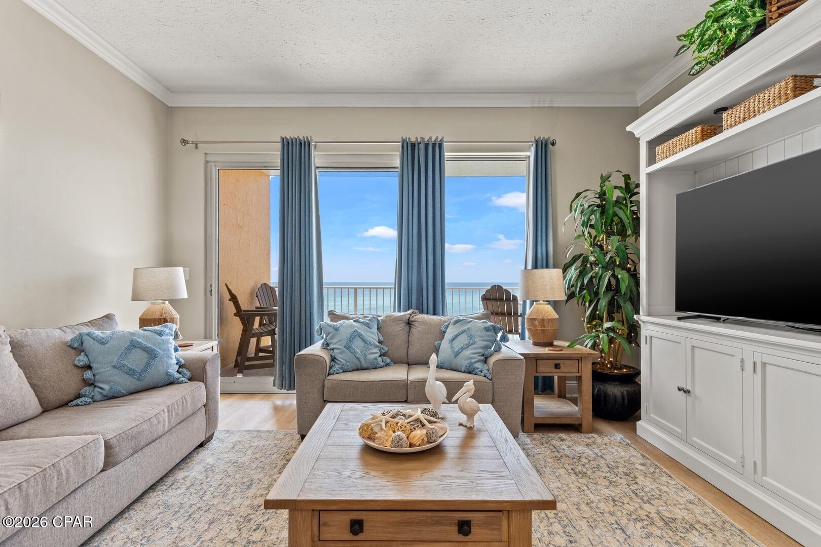 Wake up to breathtaking Gulf views from this beautifully renovated 2-bedroom, 2-bath condo with a bunk area, perfectly positioned on the quieter east end of Panama City Beach. From the moment you step inside, floor-to-ceiling windows frame the emerald waters and fill the open-concept living space with natural light, while an oversized Gulf-front balcony invites you to relax, dine, and soak in unforgettable sunsets.
Designed for both comfort and style, this turnkey condo is offered fully furnished with custom furnishings, most from Pottery Barn, and showcases extensive recent renovations including luxury vinyl plank flooring, updated lighting, a new HVAC system, renovated kitchen and bathrooms, new toilets, and more. The bright, coastal-inspired kitchen features quartz countertops, white shaker cabinetry, stainless steel appliances, recessed lighting, a spacious breakfast bar, and abundant prep and storage space, flowing seamlessly into the dining and living areas.
The Gulf-front primary suite is a true retreat, complete with private sliding glass doors opening directly to the expansive balcony, allowing you to wake each morning to panoramic beach views. A full-size laundry room with washer and dryer adds everyday convenience.
Located on the third floor, you'll enjoy the ease of walking directly across the sky bridge from the parking garage--no waiting for elevators. Treasure Island offers resort-style amenities including a beachfront heated pool, separate kiddie pool, shaded gazebo and lounging areas, direct beach access, Gulf-view fitness center, game room, seasonal beach service, and on-site security.
Situated near St. Andrews State Park on the peaceful east end of Thomas Drive, you'll be just minutes from marinas, golf courses, waterfront dining, live entertainment, and local favorites like Schooners and Captain Anderson's. Whether you're looking for a primary residence, vacation getaway, or exceptional rental investment, this move-in-ready Gulf-front retreat offers the very best of coastal living.