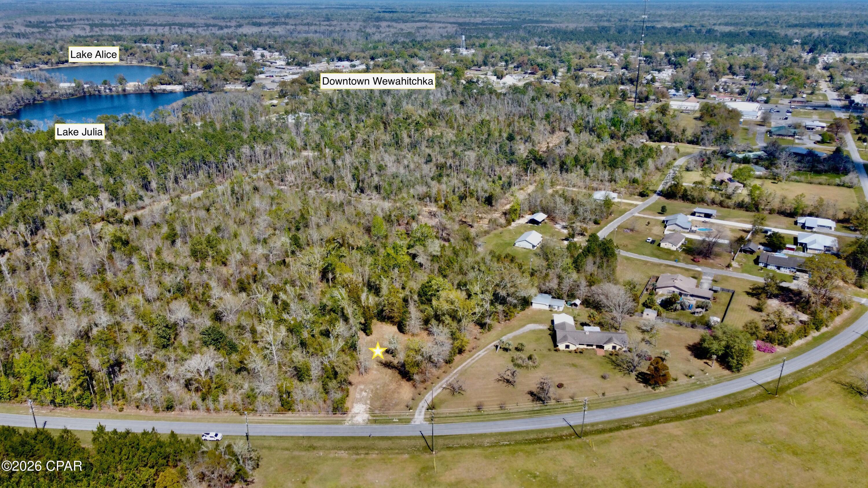 Perfect opportunity to own a spacious 1/2 acre CLEARED lot in the charming center of Wewahitchka. This level, easy-to-develop property is a dream for outdoor enthusiasts. Located just moments away from Lake Julia and Lake Alice, and the hauntingly beautiful Dead Lakes, you'll have world-class freshwater fishing and boating at your fingertips. If you crave the salt water, you're in luck--this property serves as the perfect gateway to the Gulf. Just a 30-minute drive to the pristine shores of Mexico Beach or the boutique shopping and dining of Port St. Joe. Whether you are looking to build a custom residence or a secondary getaway, this lot offers the peace of small-town Florida with easy access to the coast.