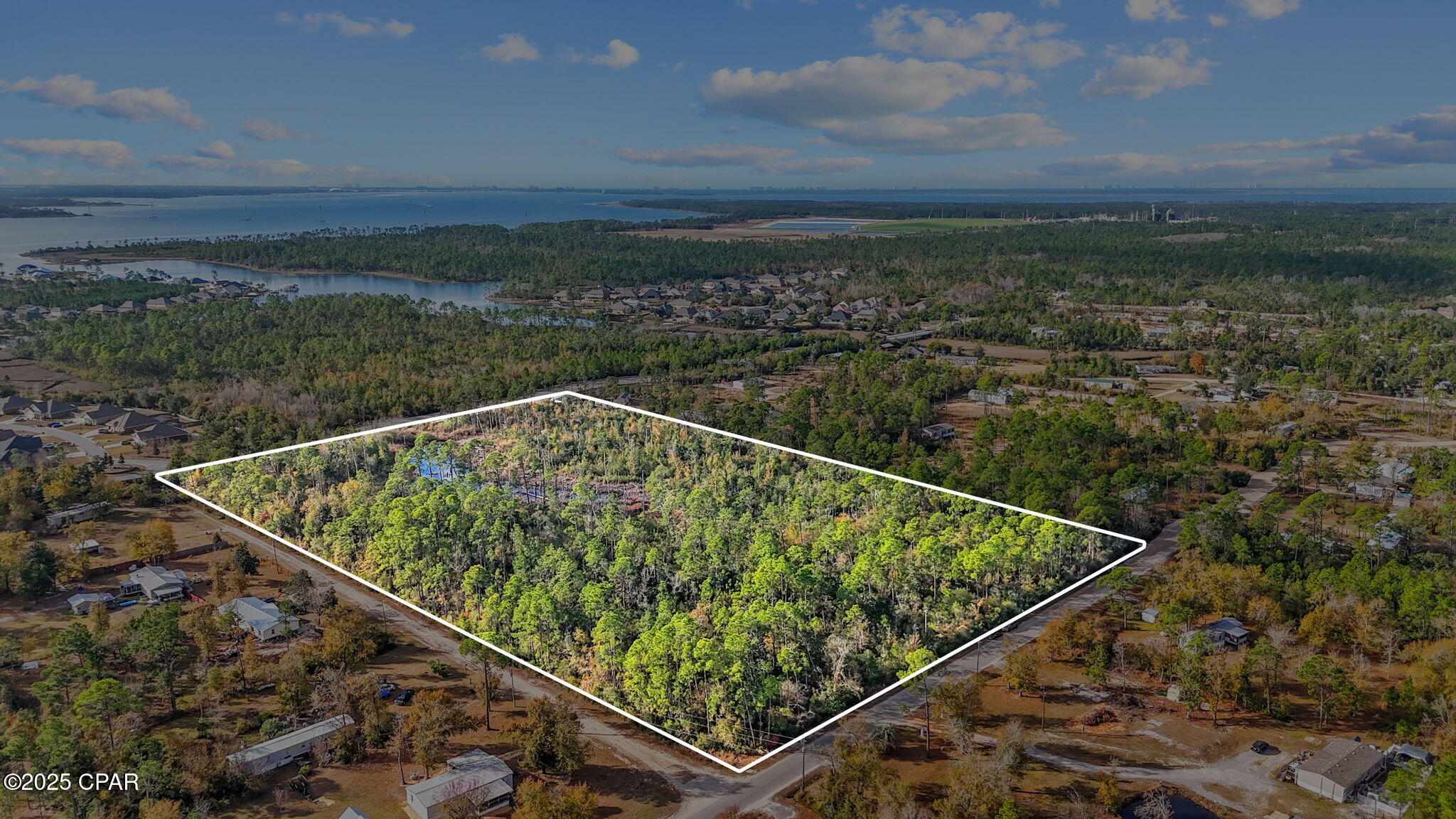 14.25± Acres | R-2 Zoning | Prime Development Opportunity Near Lynn Haven

An outstanding opportunity to acquire 14.25± acres of R-2 zoned land, offering strong development potential in a highly desirable area. Located less than 10 minutes from Lynn Haven, this property provides the ideal balance of accessibility, growth, and future upside.

The size and zoning of this parcel make it well-suited for a residential development, whether your vision includes single-family homes, duplexes, or a thoughtfully planned community (buyer to verify density and use). With ample acreage to design an efficient layout, this site presents multiple possibilities for builders and investors looking to capitalize on continued demand in the area.

Conveniently positioned near shopping, schools, dining, and major roadways, this property offers both location and scale—two key ingredients for a successful development project. Large tracts with favorable zoning and close proximity to Lynn Haven are becoming increasingly scarce.

Bring your plans, your team, and your vision—this is a property with real potential.

Buyer to verify zoning, density, utilities, and development feasibility.