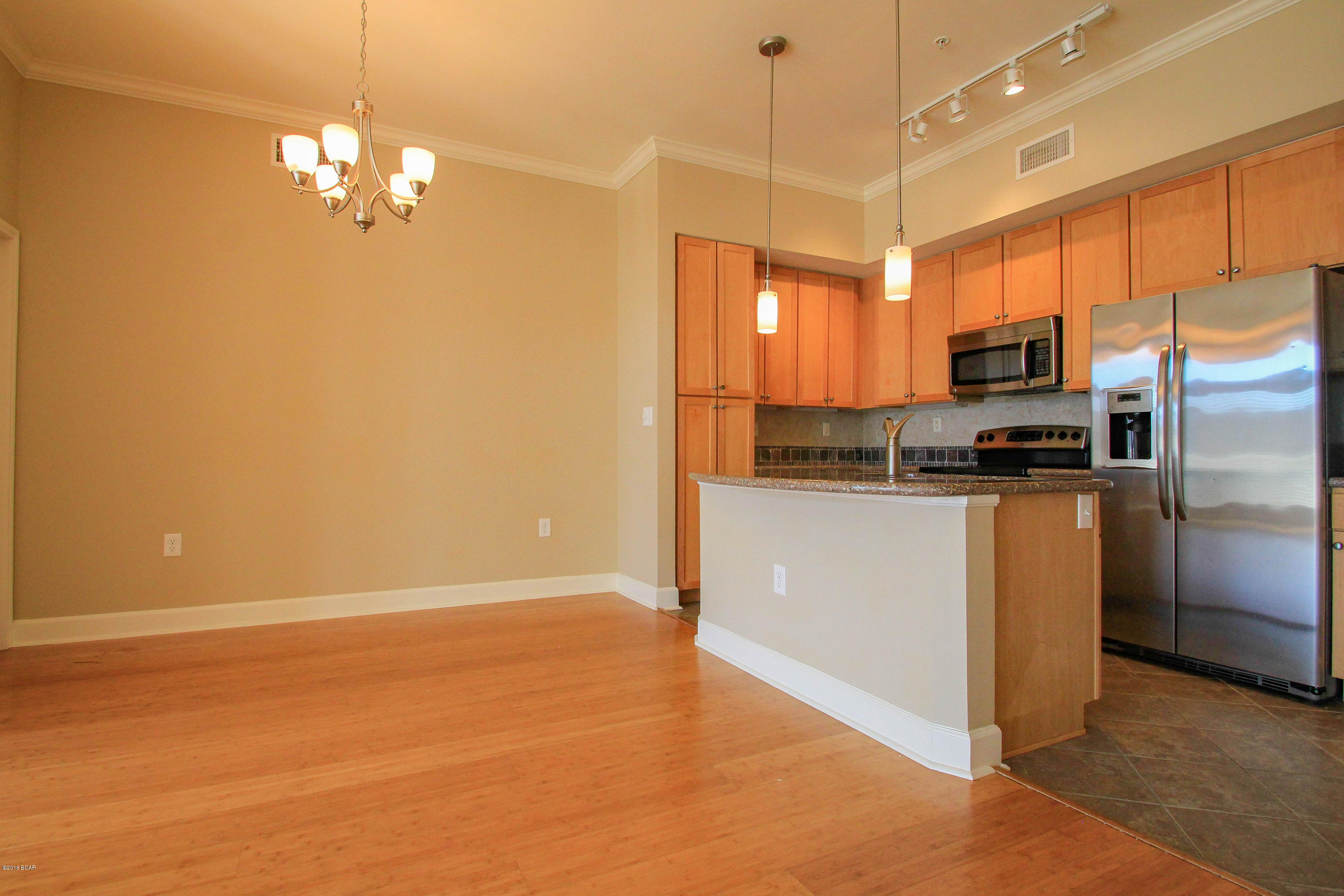 If Living in a Resort style Luxury condo near the Beach is your goal, then you have found the right Community to live in. This Rental is clean, Open concept with Bamboo floors, 2 master Suites both with walk in closets. the grounds are Pristine, the amenities are top of the line with a 1 acre pool. Security is a priority for the Association who prides themselves on running the Best Gated Community for Resident only living. No Vacation rentals allowed and the Rules and Regulations help keep this an upscale Community with great location just 1 mile from the Beach & very close to the Bridge giving anyone quick access over into Panama City, Lynn Haven, or Callaway. Not only is the State of the Art Fitness Center included ,so is Water, Sewer, Pest Control, Trash, Security, Maintenance. NO PETS!