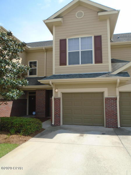 This 3/2.5 townhome offers an open living room/kitchen, hardwood floors downstairs, 9' ceilings throughout, spacious floor plan, screened in back porch, and large walk-in closets. The kitchen features black appliances and black tile granite. The master bath has a double vanity sink and large walk in closet; with a separate laundry room nearby, 2 bedrooms and bath complete the upstairs. There is a large one-car garage for parking. All this and in a gated community, close to the mall, restaurants, theaters and hospitals. The complex has a large club house and a pool!