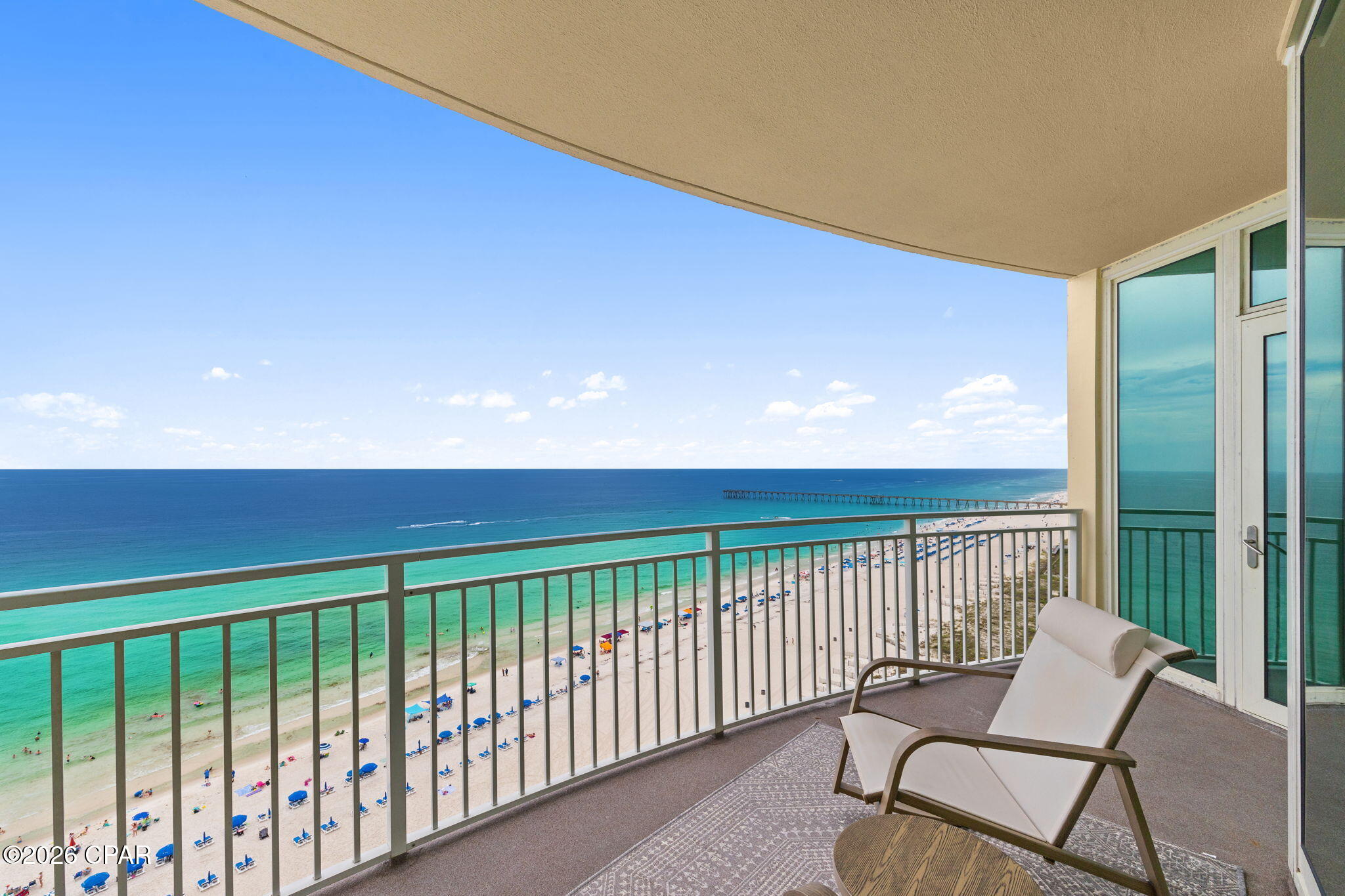Experience the space, comfort, and flexibility of a two-bedroom condominium while enjoying the value of a one-bedroom floor plan. This spacious 1BR/2BA unit with a bonus room in Aqua offers one of the largest one-bedroom gulf-front layouts on Panama City Beach, delivering exceptional space and livability relative to its price point among similar beachfront condominiums.

Floor-to-ceiling glass defines the main living space, filling the open kitchen, dining, and living areas with natural light while framing uninterrupted views of the sugar-white sand and emerald waters of the Gulf. The west-facing elliptical balcony extends the living area outdoors, creating a private front-row setting for sunsets, coastal breezes, and year-round gulf views.

The interior is designed for durability and ease of ownership, featuring hard-surface flooring throughout with luxury vinyl plank in the bedrooms and tile in all main living areas. The kitchen includes granite countertops, stainless steel appliances and a breakfast bar. 

The gulf-front primary suite offers direct balcony access and uninterrupted water views. The spacious ensuite bath includes dual granite vanities, a walk-in shower, separate soaking tub, and walk-in closet. The bonus room provides a true secondary sleeping area. The current configuration accommodates up to five guests with a king bed in the primary, a double bed in the flex room, and a queen sleeper sofa in the living area.

Aqua stands out with its architectural design, highlighted by a grand porte-cochère entry, expansive lobby, and signature cascading water features. Amenities include two beachfront pools, a heated indoor pool, hot tub, steam room, poolside café, seasonal activities, and direct beach access.

The location places you within walking distance of Pier Park for dining, shopping, entertainment, and concerts, and just minutes from Topgolf, Dolly Parton's Pirates Voyage Dinner & Show, and other Panama City Beach dining and entertainment options.

Own a gulf-front floor plan that prioritizes usable space, flexibility, and location in equal measure - without stepping into the price point of a traditional two-bedroom condominium. See it for yourself today!