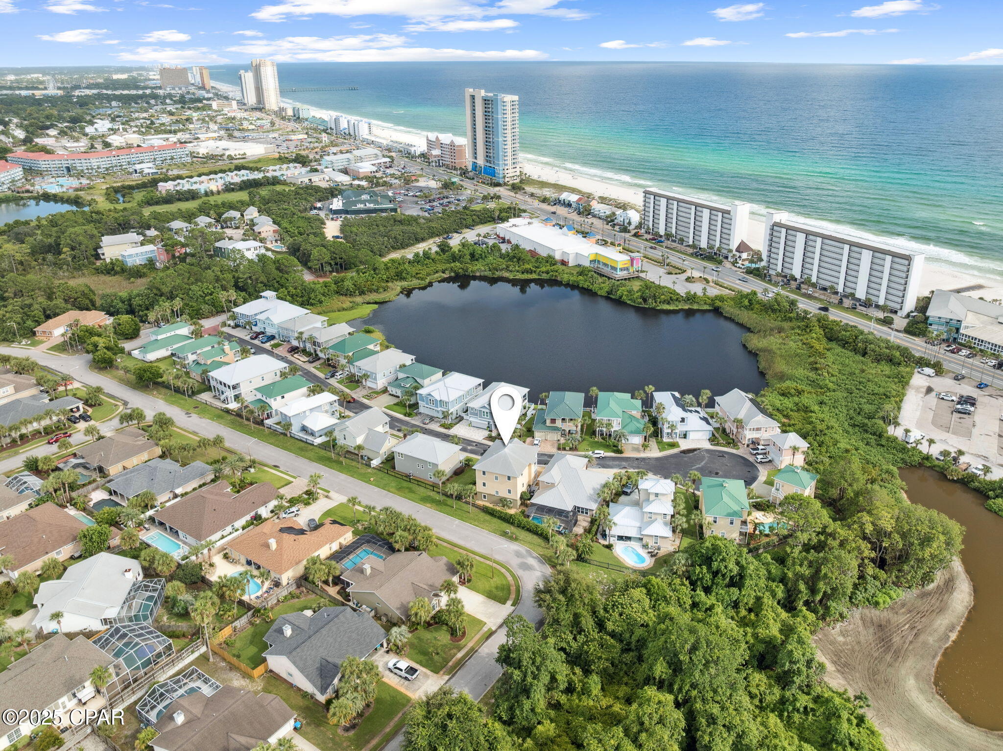 This is a fantastic price improvement and one of the best values currently available.  If you've been considering this property, now is the time to act before it's gone.  Experience coastal living at exceptional value.  This is a great opportunity!
Your One-of-a-Kind Beach Retreat-Steps from the Gulf.
Welcome to this stunning, fully furnished beach house just few steps from the Gulf of America.  Designed with comfort, elegance and durability in mind, this home offers a rare combination of coastal charm and high end features.  Relax on any of the multiple balconies where you can feel the ocean breeze and soak in views of the Gulf and nearby lake.  The third floor balcony offers the best of both worlds-gorgeous water views in every direction.  Inside, the owner's impeccable taste is evident in every detail.  Hurricane proof windows rated to withstand up to 155 mph provide peace of mind, while front-facing windows and transoms are tinted for added privacy and comfort.  A private elevator accommodates up to 4 people (1000 lbs), making every level of the home easily accessible. 
The open-concept living areas feature crown molding thoughout, rich bamboo wood floors, and tile in the kitchen and bathrooms.  The gourmet kitchen boasts granite countertops, abundant cabinetry, and stainless steel appliances, while each bathroom also features elegant granite finishes.  Special touches include a central vacuum system for convenience, a tankless water heater for energy savings, and a split garage with ample space for tools and storage.  The inviting living room offers an electric fireplace-perfect for cozy nights in.
The first floor bedroom serves beautifully as a private mother-in-law suite, providing flexibility for guests or extended family.  
This home is a perfect blend of style, comfort and strength, a true coastal gem ready for its next chapter.
Please schedule your private showing on this one of a kind property now!