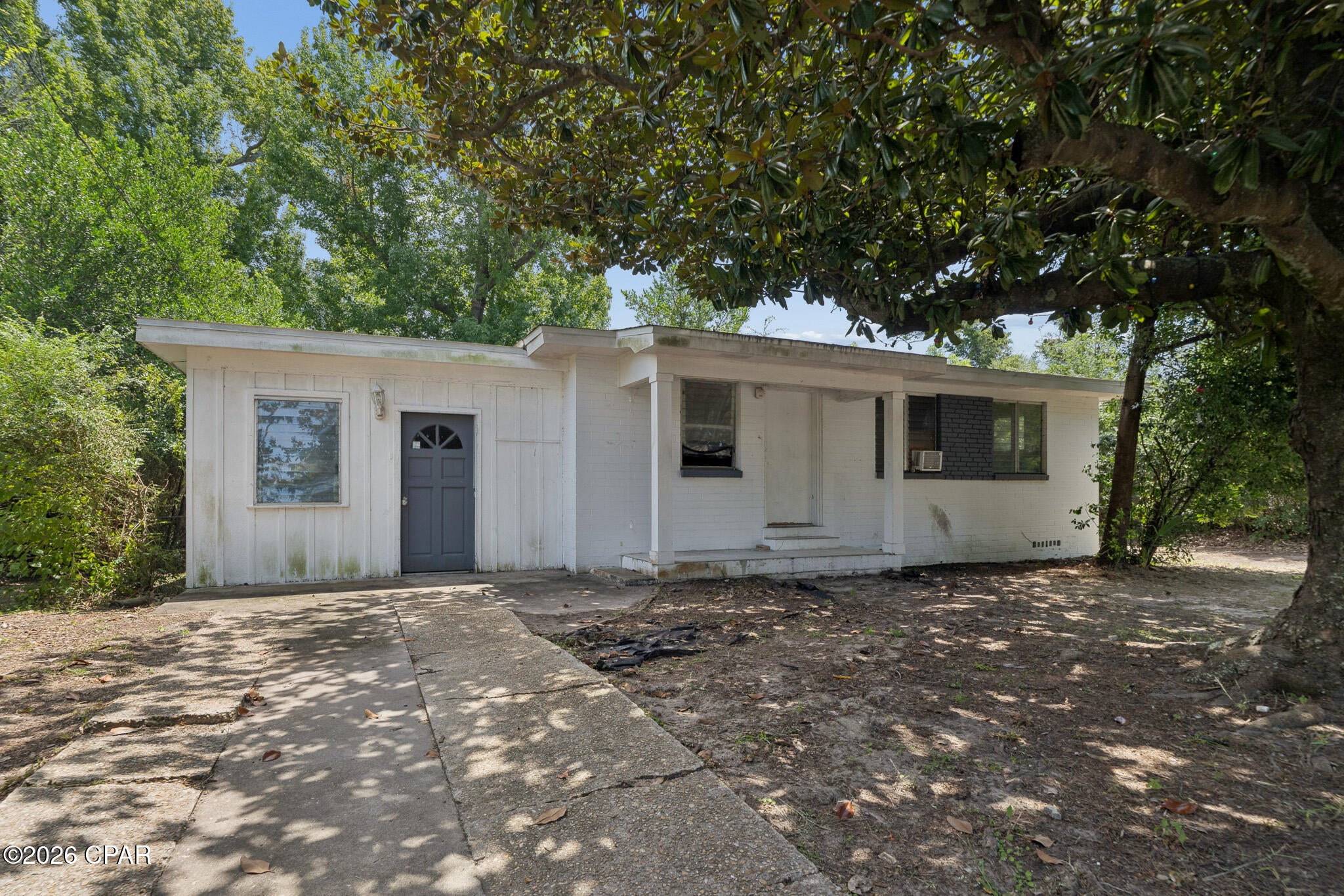 Investor Opportunity in the Heart of Panama City! This block home is ready for renovation and offers plenty of potential as an investment property, rental, or primary residence. Situated on an oversized lot of approximately 0.44 acres, there's ample outdoor space with room to make the property your own. Conveniently located near 23rd Street with easy access to shopping, dining, medical facilities, schools, and other everyday conveniences. Property is being sold AS-IS, WHERE-IS. All measurements and information deemed important should be independently verified by buyer.