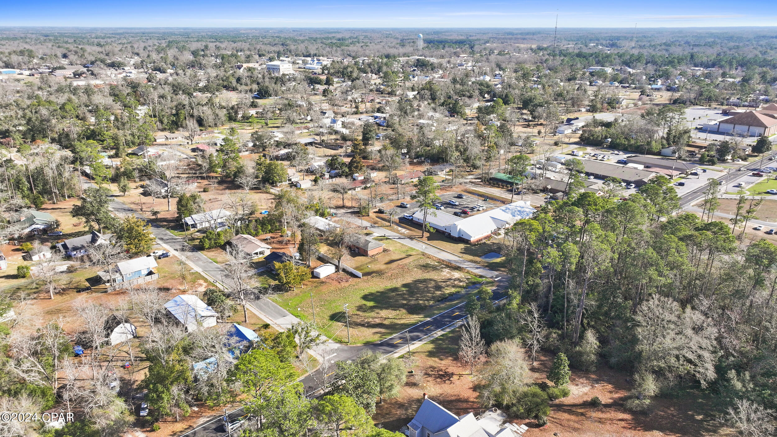 Discover the perfect backdrop for your future home on this surveyed and cleared corner lot nestled in the heart of Chipley. With access to public water and sewer, you're poised to create a residence that effortlessly complements the charm of this beloved community.

As downtown Chipley blossoms and evolves, local restaurants and shops are playing pivotal roles in its growth. Embrace the spirit of this thriving community, relishing in the existing amenities while eagerly anticipating the promising developments on the horizon.

With the groundwork already laid, it's your opportunity to transform this delightful location into the cornerstone of your life in Chipley.  Amidst the small-town charm and the town's expanding allure, your dream home awaits its realization.  Plus, there's an additional adjacent corner lot available for purchase, offering even more potential for your ideal living space.