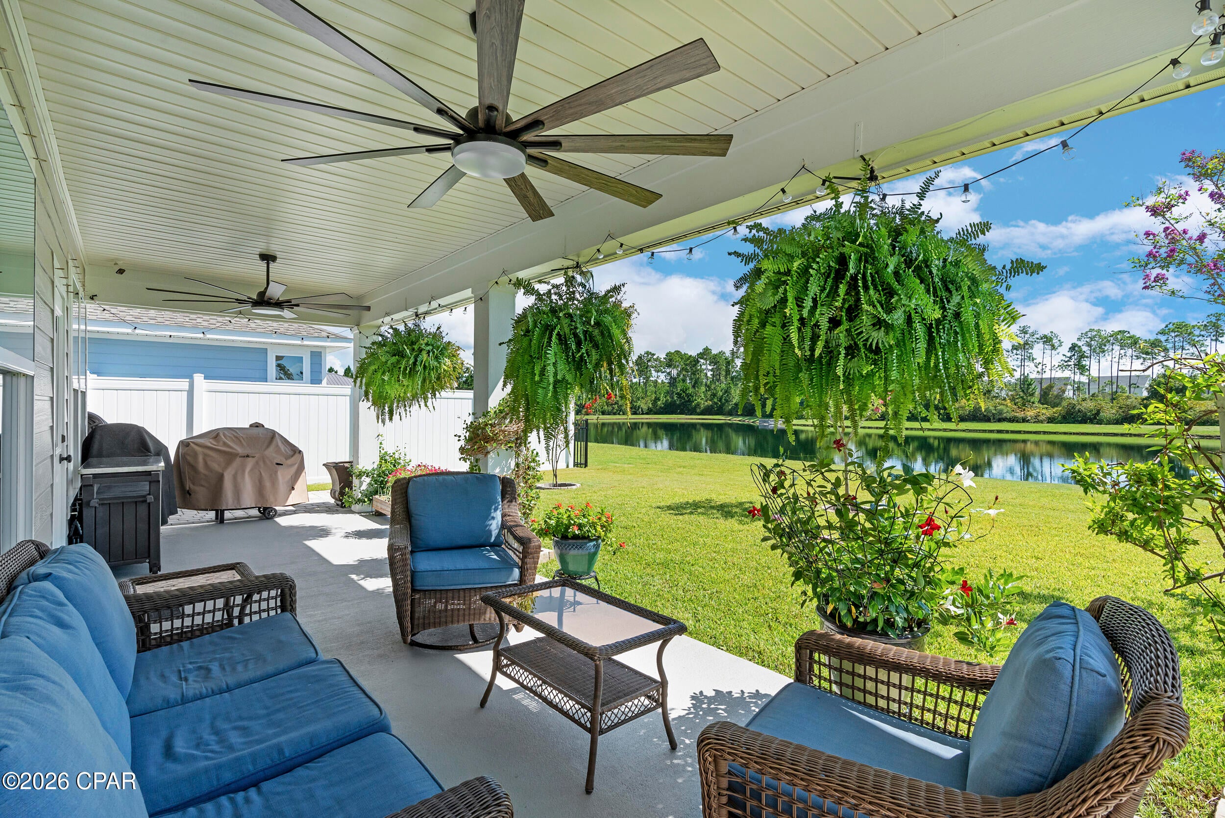 Set along a peaceful pond and nature preserve in Breakfast Point, this home brings together comfortable indoor living and an inviting outdoor space with a view you'll appreciate every day. With three bedrooms, two full bathrooms, and a versatile bonus room, the layout offers plenty of flexibility for the way you live now and as your needs change.

Built by David Weekley Homes, the house offers a cohesive combination of quality finishes and practical design. Hardwood flooring runs throughout, while crown molding adds architectural detail from room to room. 

At the center of the home, the open-concept design connects the kitchen, dining area, and family room, creating an easy flow for both everyday living and entertaining. A large kitchen island with an integrated sink provides generous workspace and a natural gathering point, while the spacious pantry keeps the kitchen organized. Under-cabinet lighting adds both function and warmth to the kitchen, complementing the home's polished finishes.

The owner's retreat offers a comfortable place to unwind, with a generous walk-in closet and an upgraded owner's bath featuring a super shower. Two additional bedrooms and a second full bathroom provide comfortable space for family or guests.

The flexible bonus room, enclosed by 10-light double French doors, gives you a dedicated space that can adapt to your household. Use it as a home office, study, playroom, hobby room, reading space, or additional sleeping area when needed. A dedicated laundry area and two-car garage with a smart garage door opener add to the home's everyday functionality.

The extended covered lanai takes advantage of the home's setting, creating another place to relax, dine, or entertain outdoors. Two oversized 72-inch smart ceiling fans make the space even more inviting, while the pond and nature preserve beyond provide a peaceful green outlook and a sense of openness that is difficult to create with landscaping alone.

The home's practical improvements continue with paver walkways along both sides, a whole-home water filtration and softener system, five-zone Rachio smart irrigation system and a dedicated garbage-can enclosure. Each adds a little more convenience to the experience of owning the home.

Breakfast Point offers a neighborhood setting where parks, playgrounds, sidewalks, and trails are part of the everyday landscape, with easy access to Gayle's Trails for walking and biking. Although this home feels surrounded by greenery and nature, its location is remarkably convenient to the rest of Panama City Beach, keeping shopping, dining, recreation, entertainment, and the beach close at hand.

For a buyer looking for a home that combines a flexible floor plan with a beautiful natural setting, this one offers plenty to appreciate. Schedule your private showing today.