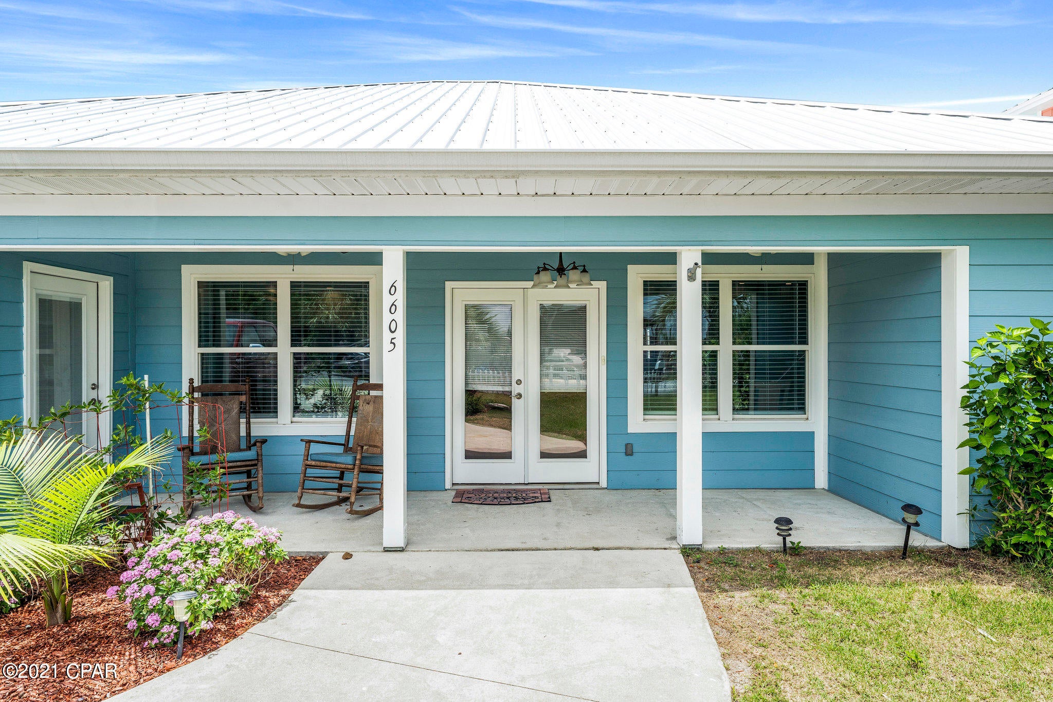 CURRENTLY UNDER CONTRACT, SELLER ACCEPTING BACKUP OFFERS  Incredible opportunity to either live in a turn-key home near the beach or investment opportunity to put on a rental program.  This single story home has been tastefully and completely renovated in 2019.  Rocking chair front porch overlooks picture perfect front yard with picket fence.  Step inside to all tile floors, neutral color palette, open concept kitchen with granite & stainless appliances, 4 bedrooms, and 2 full baths.  Newly added master ensuite has large walk in tiled shower and nice natural light. Laundry room in rear of home walks out to fenced back yard. Two rooms are digitally staged.
