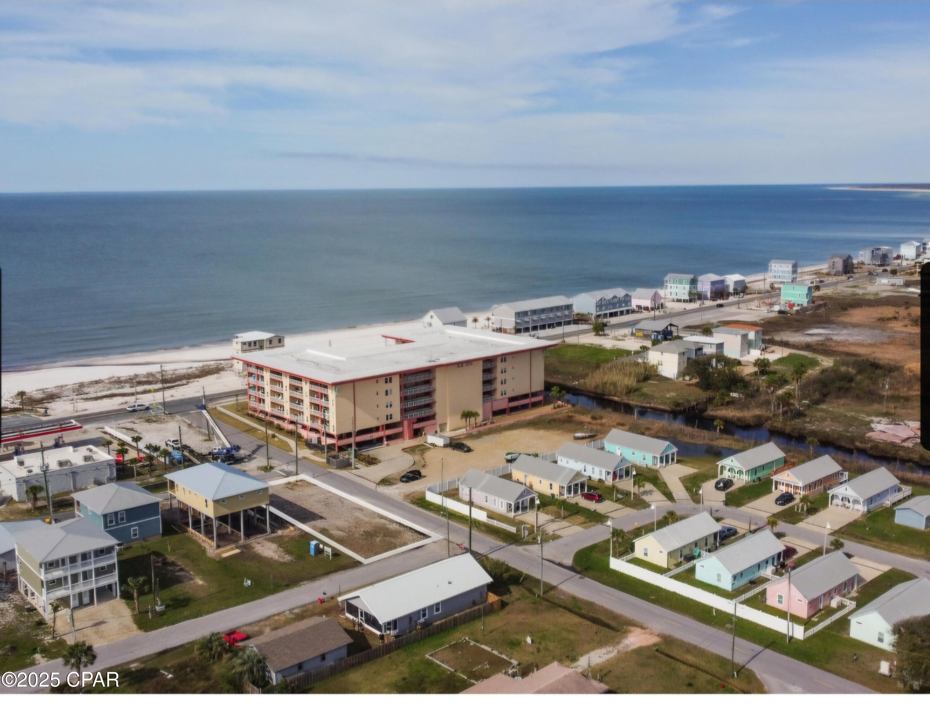 JUST REDUCED! 

Prime corner lot with Gulf views in the heart of Mexico Beach, Florida! Located at 116 8th Street, this ready-to-build homesite offers an incredible opportunity to build your dream beach home, vacation rental, investment property, or second home along Florida's beautiful Forgotten Coast.

Situated just one block from the sugar white sand beaches of the Gulf of America, this centrally located corner lot offers Gulf views, public beach access directly across Hwy 98, and is conveniently located across from Toucan's. Enjoy being close to local restaurants, shopping, parks, playgrounds, and the public boat ramp.

Mexico Beach is known for its peaceful coastal lifestyle, excellent fishing, boating, stunning sunsets, and uncrowded beaches. Whether you are looking for full-time coastal living, a relaxing beach retreat, or a short-term rental investment opportunity, this property offers an ideal location in one of the Gulf Coast's most desirable beach communities.

Conveniently located near Port St. Joe, WindMark Beach, Panama City, and Tyndall Air Force Base. Rare opportunity to own a Gulf view lot in Mexico Beach at a newly reduced price. Bring your builder and start planning your coastal dream home today!