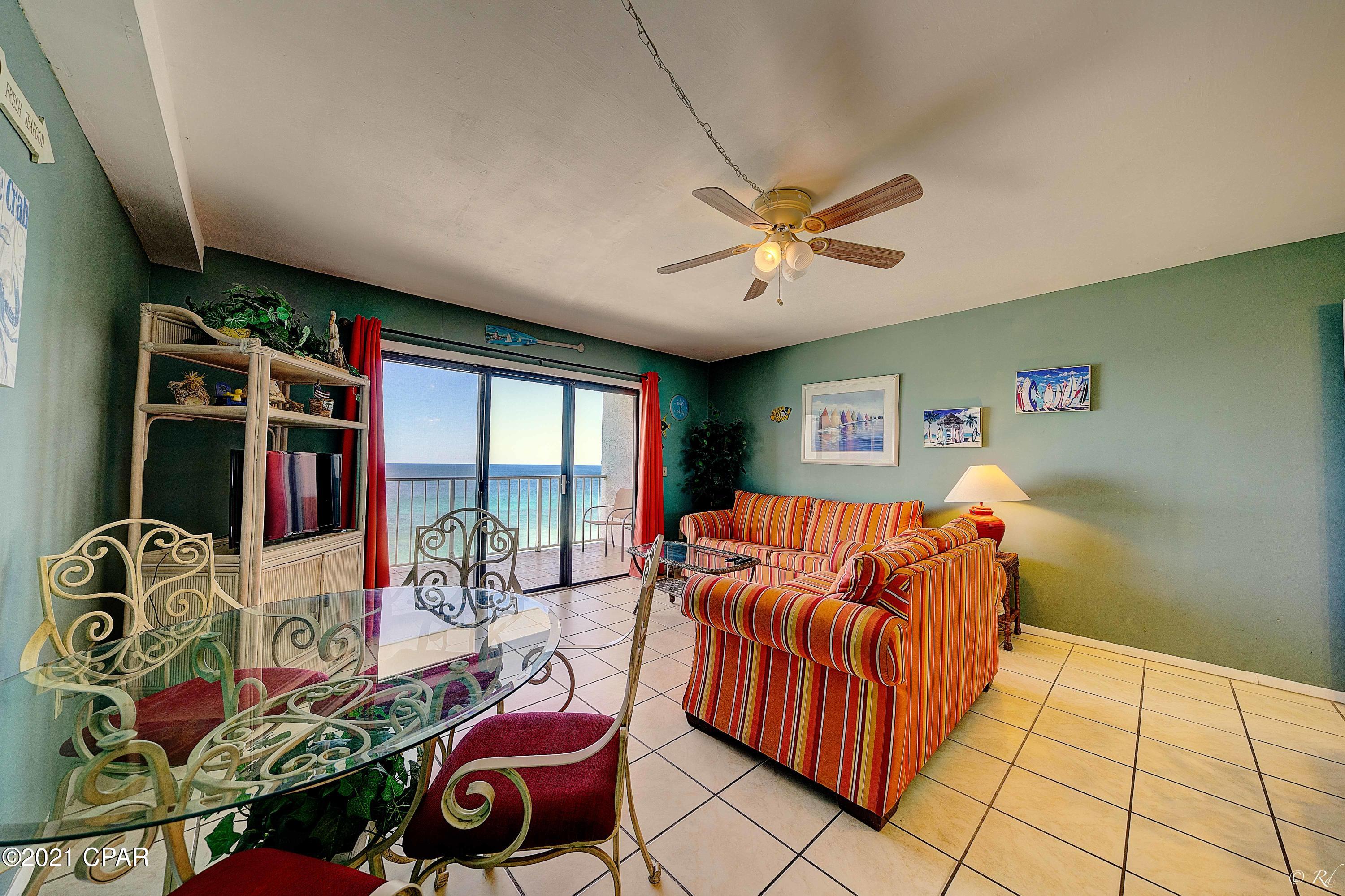 This fully furnished condominium, located in the desirable Summit Beach Resort, has a beautiful view of the Gulf and is a perfect distance for plenty of beach days with family. Enjoy the Florida sun with the comfort of your own private balcony. This unit features an open living room with a joined comfortably sized kitchen area. The kitchen boasts white appliances, plentiful storage space, and a mirrored breakfast bar. Through the hallway, there are bunks with a shared half bath for your convenience. The master bedroom features a private ensuite with a shower/tub combo and tile flooring throughout. Summit Beach Resort boasts two large swimming pools, hot tubs, saunas, a fitness center and much more!  It is also within walking distance to restaurants, a golf course, and just a few steps from the soft, white sand of Florida's beaches.  The Summit Beach Resort is the perfect place for a summer getaway!