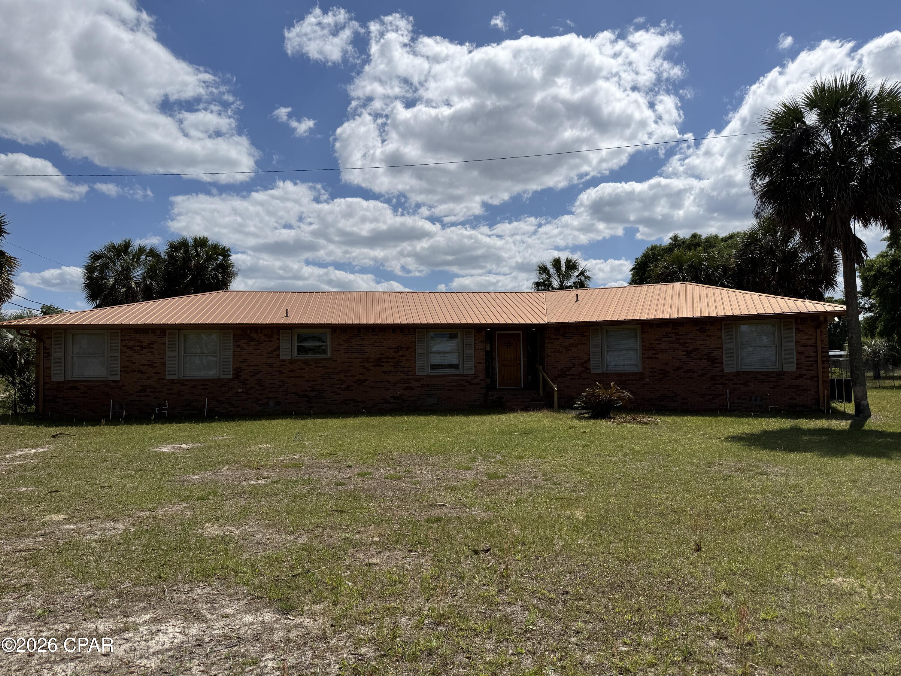 Classic North Florida turn-key ranch on 40 acres in northern Bay County. The high quality vintage 4/4 ranch sprawling beneath a canopy of palms and oaks has been remodeled and is ready for homesteading. Additional land is available, up to 90 acres total, with extensive cross-fencing, multiple entry points, and potential for an immediate ranch or farm operation. Aerial footage is coming soon. Come see this North Florida coastal country jewel today.