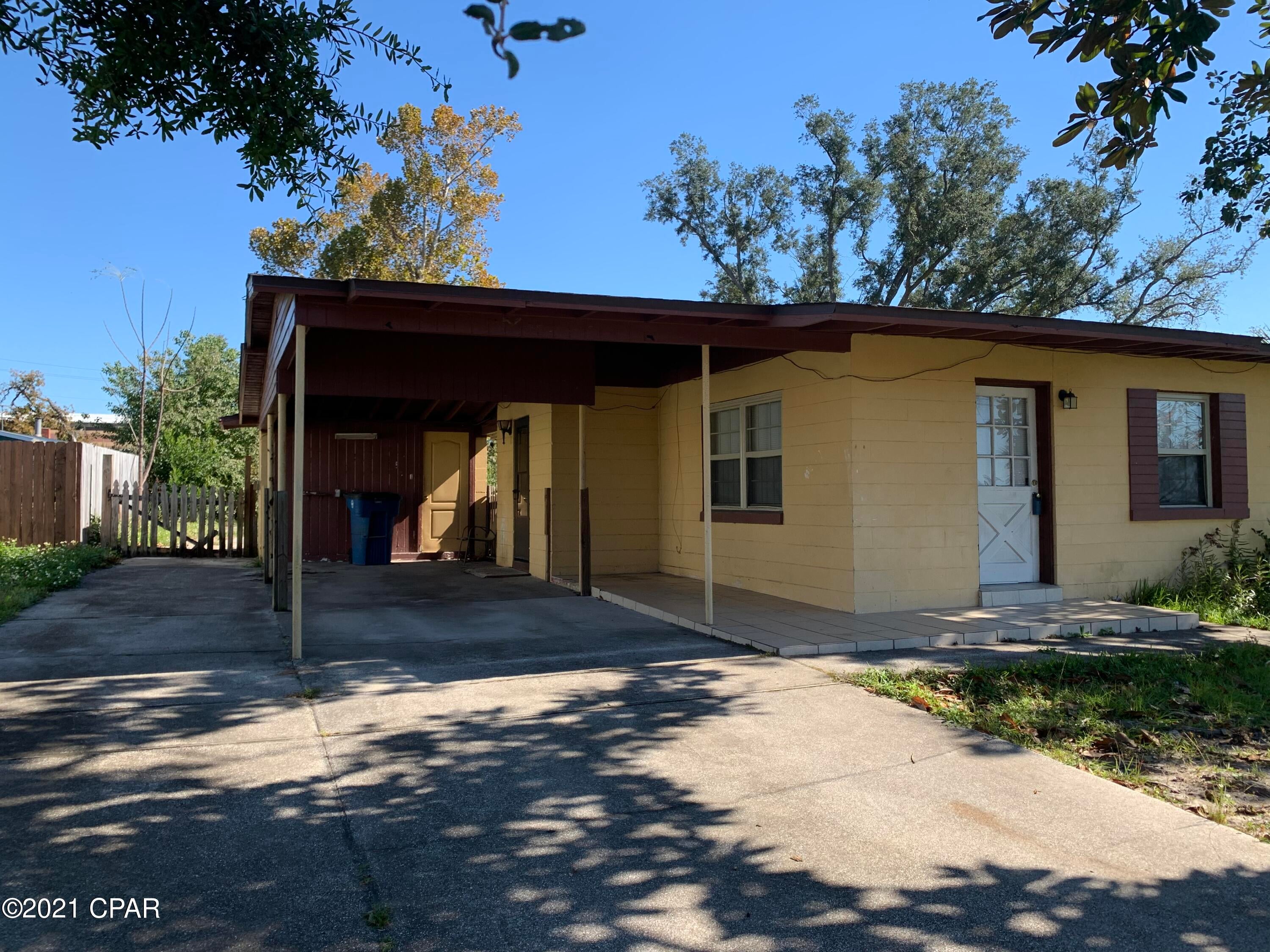 Three bedroom one bath block home centrally located in Panama City.  Home is a short drive to  Downtown Panama City and Downtown St. Andrews.  Home has tile throughout, large living room, dining area and covered parking.  The home is in need of a new roof and some TLC.