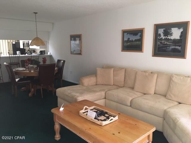 Fully furnished, two bedroom, two bathroom, 1370 square foot (upstairs) condominium located in low-density Hombre Golf Village.