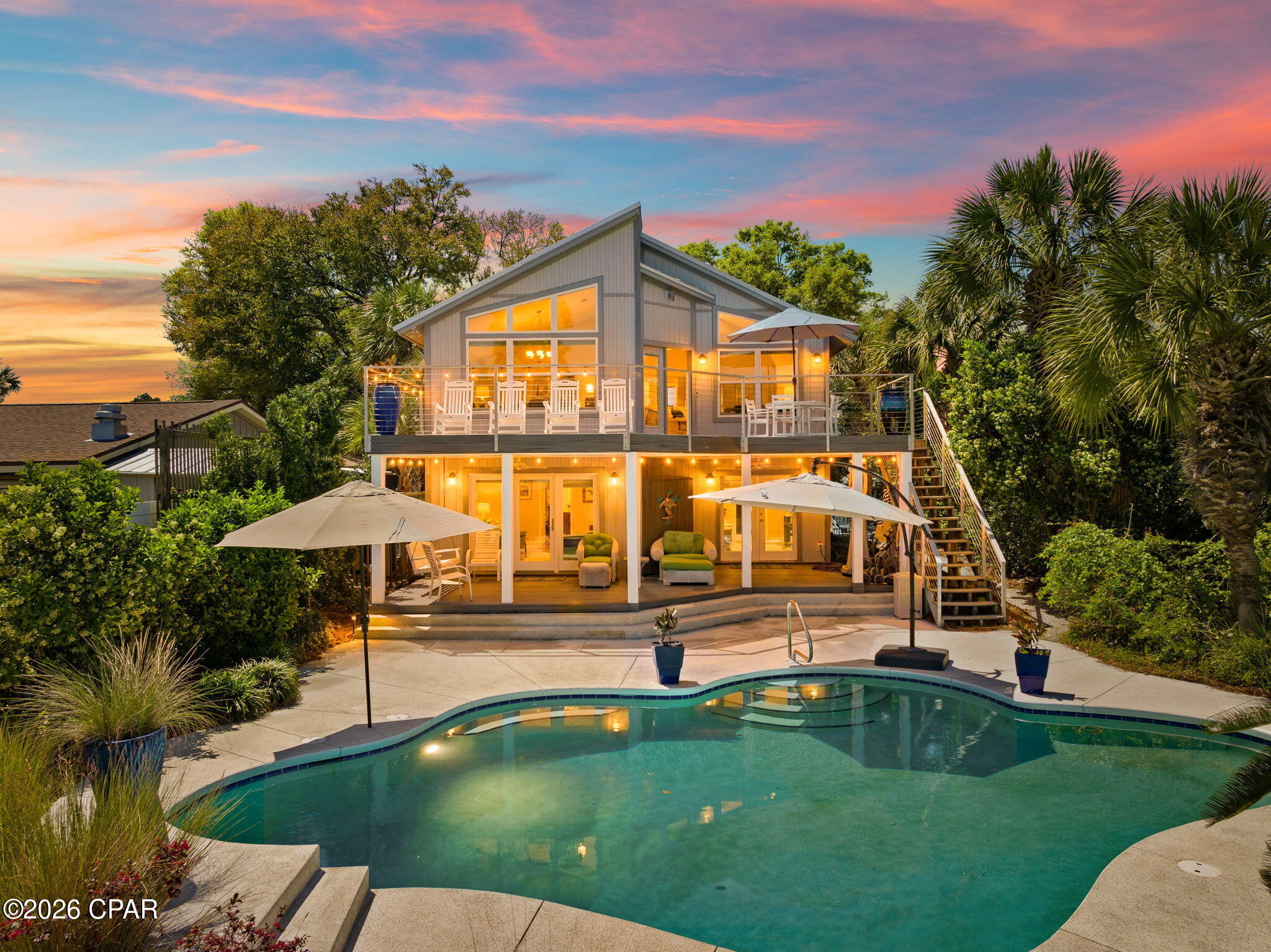Currently under contract, seller will consider backup offers. The deal of a lifetime. Welcome to 5706 South Lagoon, where elevated comfort and coastal charm come together to create the beach retreat you've been waiting for. Ideally positioned on the desirable east end of South Lagoon, and situated along the quieter side of the channel, this waterfront property offers a rare blend of privacy, accessibility, and effortless coastal living.

A true boater's paradise, this home is fully equipped for life on the water. The private dock features a 16,000 lb boat lift housed beneath a covered boathouse with a touchless cover system, accommodating vessels up to around 30 feet. Additionally, there's 2 ski lifts to fully pull your skis from the water, and a 2 ski platform for when you're ready to go. 

From your backyard, enjoy quick and convenient access to Grand Lagoon. Make it to the Gulf in right around 10 minutes, Shell Island in 10-20, Downtown St. Andrew's in 20, and Downtown Panama City in 25. This is the kind of setup that transforms weekends into experiences and vacations into traditions.

Inside, the home offers a warm and inviting coastal atmosphere designed for both relaxation and entertaining, while the outdoor living space takes center stage. Perfect for unwinding after a day on the water or hosting friends and family in a setting that feels like a permanent getaway.

Whether you're searching for a second home or a private coastal escape, 5706 South Lagoon delivers a turnkey waterfront lifestyle that's ready to be enjoyed from day one.