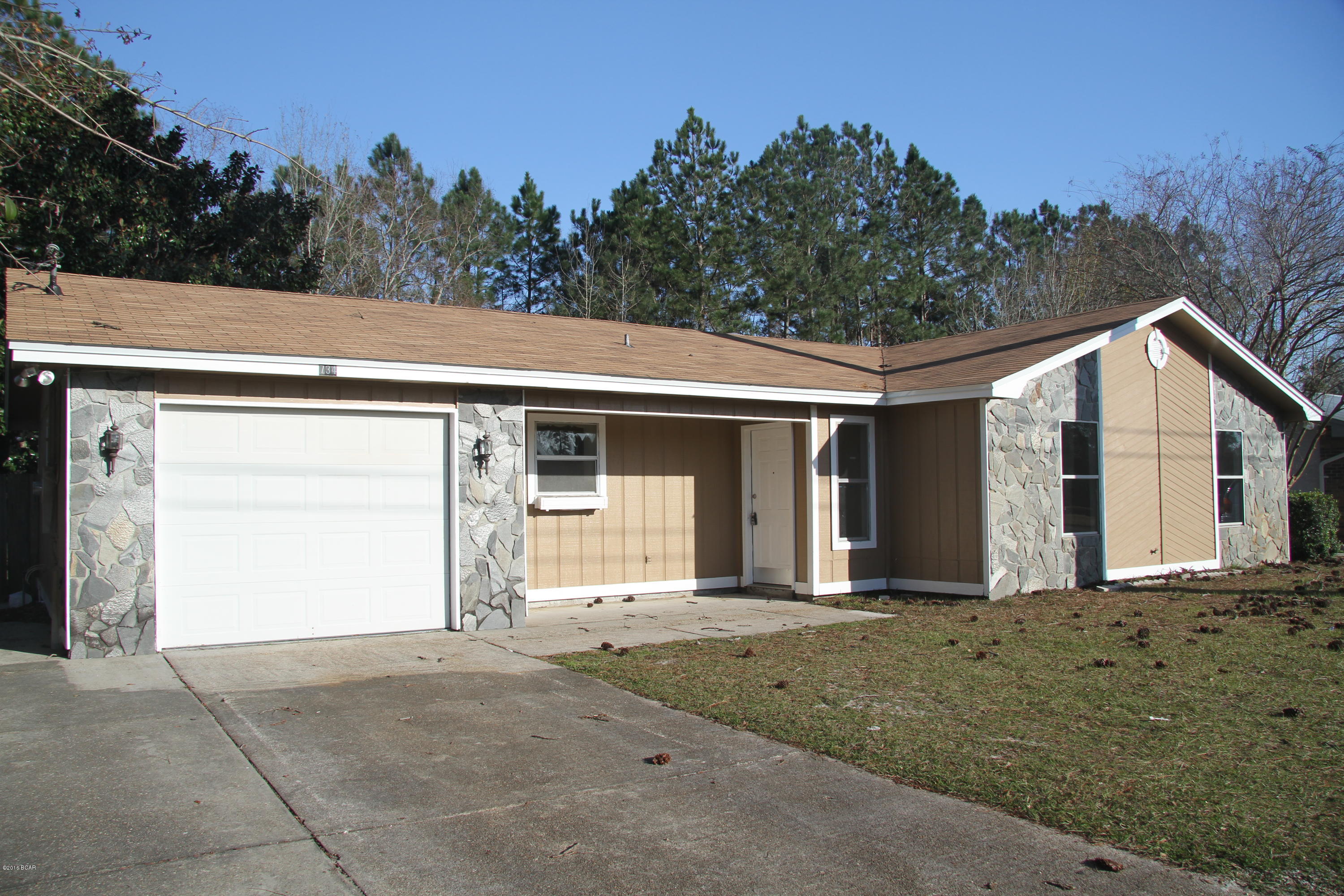 You're gonna love this home and this neighborhood! This 3/2 home has been renovated, new floors, new roof 2015, freshly painted inside and out, and even the inground pool has a whole new pump, sand filter and chlorinator! New appliances have also been ordered and will be installed soon.  The Pine Forest community is near all the important places you need access to in the town of Lynn Haven - great shopping, great schools, easy access to major highways and not too far from the beautiful beaches and gulf. The extra large 1 car garage is deep and accomodates laundry and extra storage. With a brand new roof, wind insurance should be quite reasonble.  The large privacy fenced yard with a beautiful in-ground pool will be a delight all summer for friends and family to play. Don't miss out!