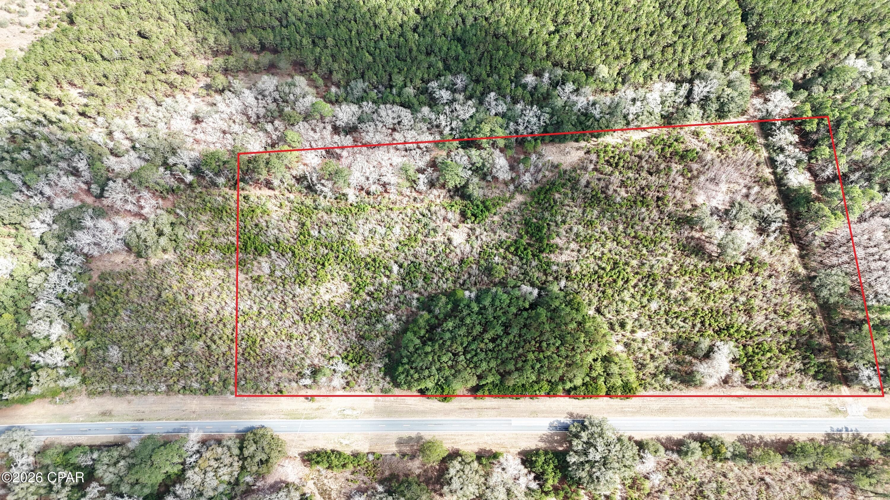 12 Acres with Highway Frontage - Country Living with Opportunity!

Discover the perfect blend of country charm and investment potential with this 12-acre parcel featuring valuable highway frontage. Whether you're dreaming of building your country home, starting a small farm, or securing land for a future investment, this property offers endless possibilities.

Enjoy the peace and privacy of rural living while still benefiting from easy access provided by the highway frontage. The property is only minutes from the Choctawhatchee River, and a little over an hour from Panama City Beach, Florida. It is also close to several natural springs.

With plenty of space for a homesite, workshop, garden, or recreational use, this land offers flexibility for a variety of uses.

Contact your Realtor today to learn more about this opportunity.

Buyer and buyer's agent to satisfy themselves to all pertinent information.