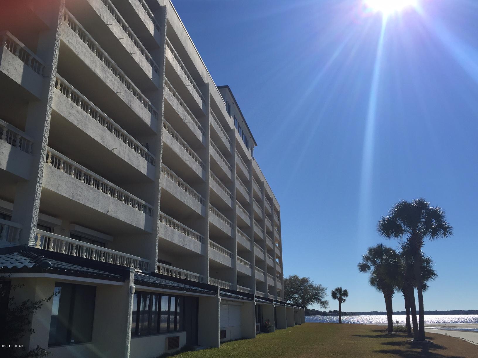 Enjoy panoramic WATERFRONT views from this 2BR/2BA 1,250 sq. ft. condo located in the heart of the Cove! Cove

Condominiums are a low-density building offering a bay front pool, tennis, clubhouse, and dock!  New windows and water heater. A separate storage room, and electric hurricane shutters are also included. Plus, the building has generator service for the elevators.  The living area and master bedroom are both BAYFRONT with access to the 156 sq.ft. balcony.  Walk to the marina, downtown, and great restaurants along scenic Beach Drive.  Washer/dryer stay.