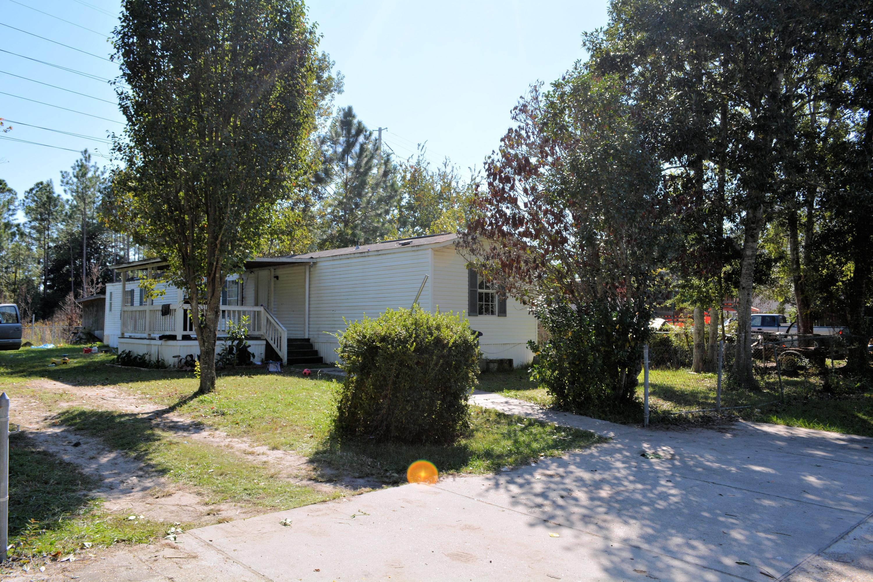Great investment opportunity.  The mobile home needs a good cleaning and the yard could stand to be cleaned up, but other than that, this is great rental property.  This home and land package is being sold ''as-is''.  Currently rented to tenant on a month to month basis.  Please do not disturb the tenant.