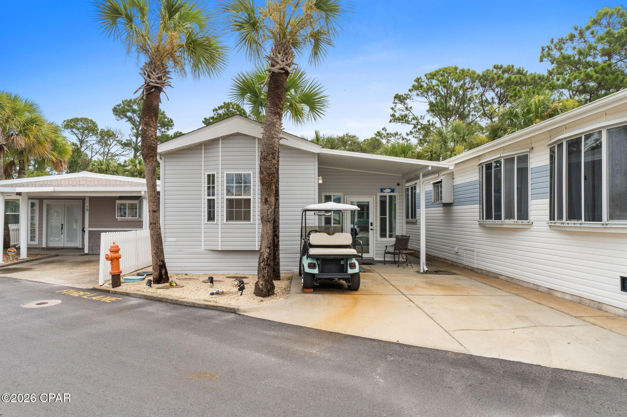 CURRENTLY UNDER CONTRACT, SELLER WILL CONSIDER BACKUP OFFERS'Welcome to easy beachside living in one of Panama City Beach's most sought-after waterfront communities, fully furnished including the golf cart!  77 Gulf loop is a charming 2-bedroom, 1-bathroom home that was built in 2017, blending modern construction with the laid-back coastal lifestyle you've been dreaming about. Step inside to find a bright, open layout with clean finishes, efficient design, and low-maintenance features that make everyday living a breeze. Both indoor and outdoor spaces welcome you with everything a beach home could offer.  This home backs up to Saint Andrews State Park, offering privacy and the occasional close up encounters with wildlife that inhabits the area.  
Whether you're searching for a full-time home, a weekend escape, or a smart investment, this property delivers on every front.
The real magic, though, is what surrounds you. Venture Out is a gated community known for its incredible amenities and unbeatable location in between the Grand Lagoon and the Gulf. Enjoy direct beach access, private boat slips for waterfront adventures, sparkling pools, tennis and pickleball courts, a fitness center, and a welcoming clubhouse. Spend your mornings casting a line, your afternoons soaking up the sun, and your evenings watching the sky turn gold over the water. With shops, dining, and Gulf-front attractions just minutes away, you're perfectly positioned to enjoy the best of the Emerald Coast.
Schedule your private showing today and discover the relaxed, resort-style life waiting for you in Panama City Beach.