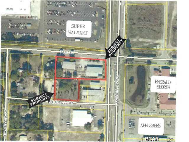 VERY LIKELY EAST SIDE OF TOWN'S HOTTEST CORNER! This L-Shaped CORNER site is across side (7th) Street from WALMART SUPER CENTER. SW corner of Tyndall Pkwy (US HWY 98) and 7th Street. Zoned Commercial per Callaway Zoning Map - currently a retail/service operation with two large metal buildings. Bldg #1 (6000+/- SF) fronts Tyndall Parkway and is a retail showroom with warehouse/service shop, small office area. Detached Bldg #2 is (3680+/- sf) on 7th Street storage/warehouse with service bays. Property L-Shaped at rear with access to McCall Dr in next block. (Back 2nd parcel on McCall formerly included multiple mobile home hook-ups). Corner site has near 100' on Tyndall Parkway with 300' along 7th street, with adjoining (L)parcel that is 155' x 148' on (McCall Listed separately at $75,900). McCall Dr. Total both parcels is near 1.2 acres. Excellent traffic count on Tyndall Parkway with endless exposure and steady traffic adjoining Super Walmart. Growing commercial area...This is the ''PERFECT CORNER'' for national chain, fast food or retail/service business with a continuous stream of exposure and available customers 24 HOURS A DAY!... HANDY SIDE STREETS (MCCALL DR & 7th ST) PROVIDE E-Z DRIVE THRU INGRESS AND EGRESS. SALE INCLUDES LAND - REAL ESTATE AND BUILDINGS ONLY - VALUE PRIMARILY LAND - No business trade, no tools, no equipment, nor inventory included. *** If corner only - not including McCall Dr (adjoining parcel making L-shape) - price then $919,000. Former use of Bldg #1 was a window blind retail/manufacture business. Current owner built Bldg #2 intended for auto paint/body work - however never used for that purpose and only used for warehouse/storage. Both buildings are mainly storage/warehouse/shop use with small retail area in Bldg #1. Owner has not provided any environmental information, it is presumed free of toxic or environmental hazards subject to buyer inspection. ALL OF BOTH PARCELS IN FLOOD ZONE X.