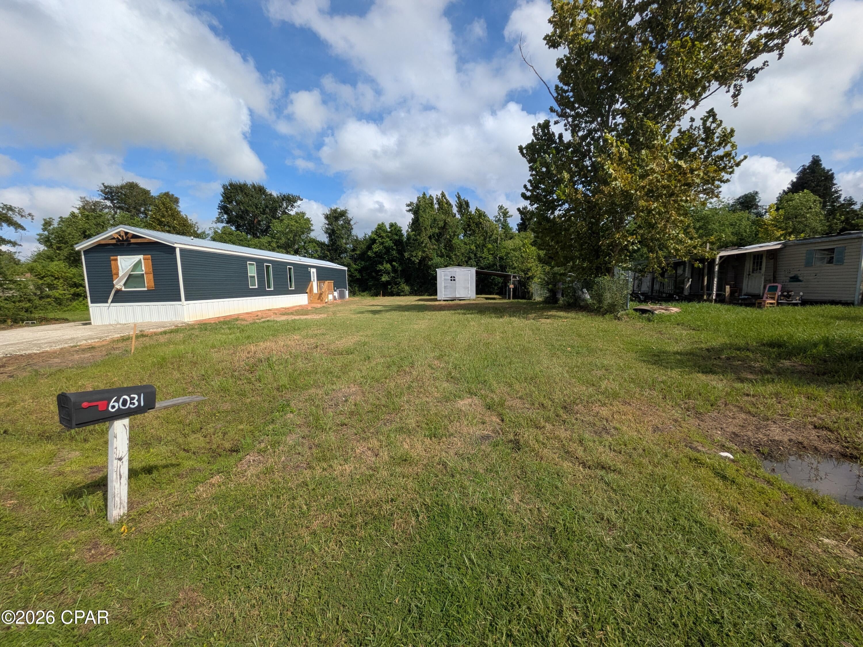 This vacant manufactured home lot is located on a quiet cul-de-sac in Callaway near shopping, dining, schools, and recreation. Water, sewer, and electric are available, no flood zone, no HOA. This neighborhood is improving daily and a new home was recently installed next door. 

Bring your kayak, canoe, or boat! Numerous public boat launches and waterfront parks within 5 minutes. Within 5 miles to revitalized and booming downtown Panama City, and 8 miles to Historic St Andrews, both with waterfront dining, entertainment, and activities. Shed is included but of no value. Lot markers are still in place and a survey is available.