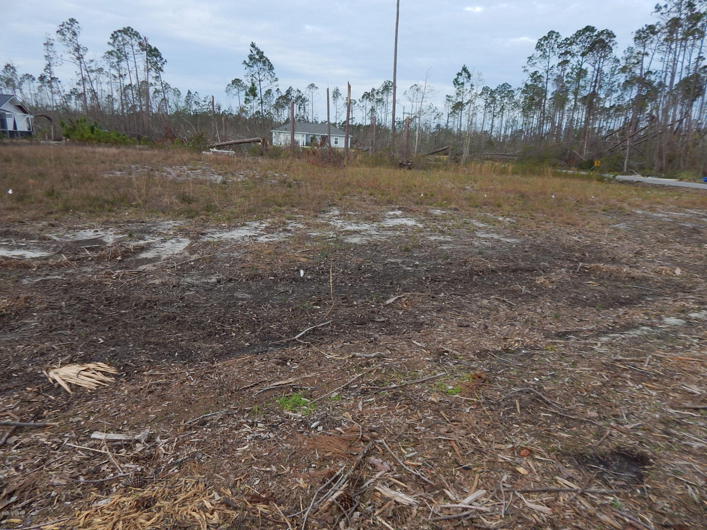 Beautiful   large 115x178 lot at almost 1/2 acre off Old Bicycle Road.   The seller has a new  survey on hand,  it has already been cleared and elevated with dirt,  driveway and septic tank permits paid.   Property is in a very nice and quiet neighborhood and close to Tyndall Air Force Base and Callaway.  This large lot will accommodate a custom built home.  No HOA fees. Existing floor plans available.