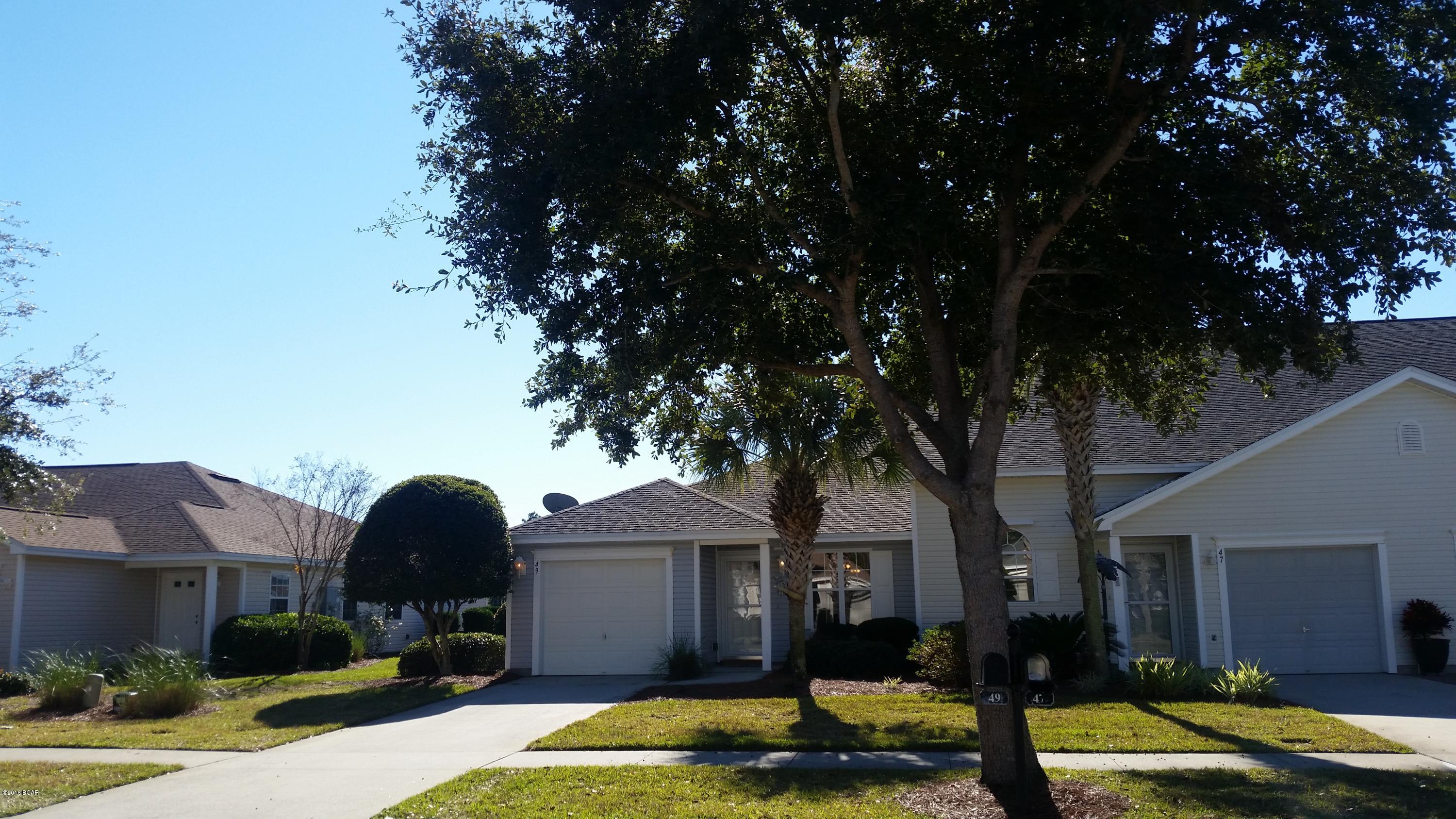 If you are looking for a nice, clean manicured community centrally located... here it is! This charming 2 bedroom/2 bath home is IMMACULATE! Spacious bedrooms, plus the master bedroom has a walk in closet and master bathroom! This home is Perfectly positioned in a more private setting with a nice sized screen room for added space and is being sold with all appliances and window coverings. New AC unit added in July 2014. This is a corner unit,located in close proximity to the swimming pool and  Pavilion also! A must see! All measurements are approximate, so please verify. SOME furnishings convey. APPLIANCES CONVEY with sale of home!