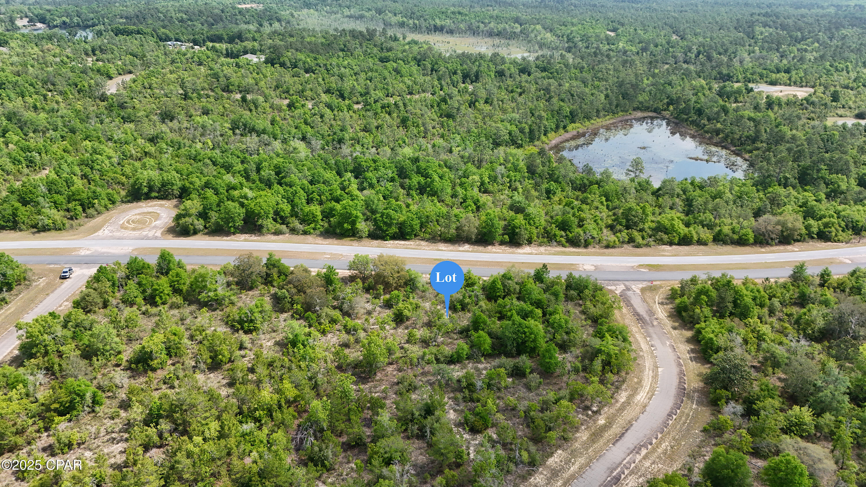 Just a short distance from the Sunny Hills Golf Club, this buildable .326-acre lot on Elkcam Blvd puts you right near the community's biggest attraction—an 18-hole public golf course. The lot offers paved access and is perfect for a future homesite with easy access to I-10, Chipley, and Panama City. Enjoy year-round recreation with nearby lakes and parks. Sunny Hills is a deed-restricted community with no HOA. Site-built homes only. Buyer to verify if water/sewer are available through US Water or if well/septic are needed.