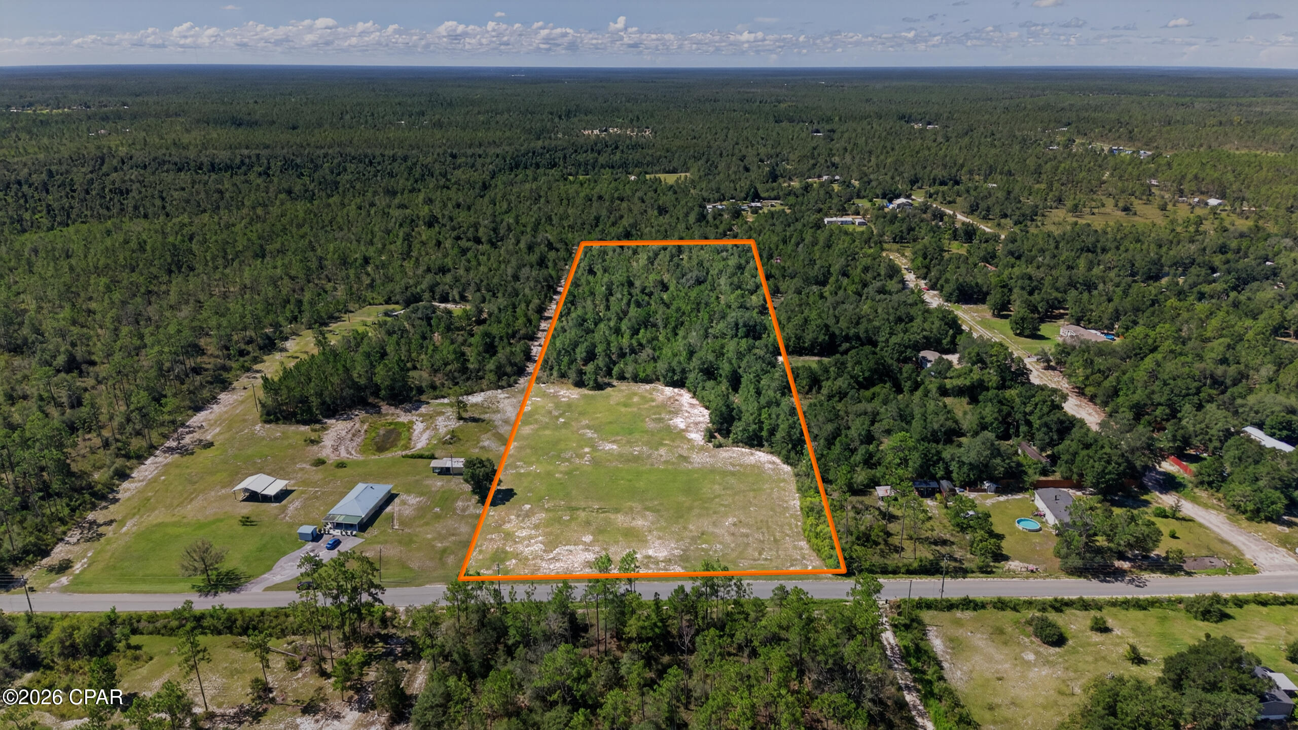 Discover the space, privacy, and possibilities offered by this beautiful 10-acre parcel, conveniently located near Highway 20 and Interstate 10. Situated on a paved, county-maintained road, the property features more than four acres already cleared--giving you a head start on bringing your vision to life.

High and dry, this spacious parcel is an ideal setting for a custom-built dream home, peaceful country retreat, hobby farm, or small family farm. There is plenty of room for gardens, animals, workshops, barns, recreational equipment, and all the extras that are difficult to accommodate on a traditional residential lot.

Whether you are a homeowner searching for privacy, a homesteader ready to embrace a more self-sufficient lifestyle, an outdoor enthusiast wanting room to roam, or a land buyer looking for acreage in a convenient location, this property offers an exciting opportunity.

The property is zoned Agriculture 1, allowing one dwelling per 10 acres. Enjoy the quiet of country living while remaining within easy reach of major roadways, nearby communities, and everyday conveniences. Bring your plans and start creating the lifestyle you have been dreaming about!