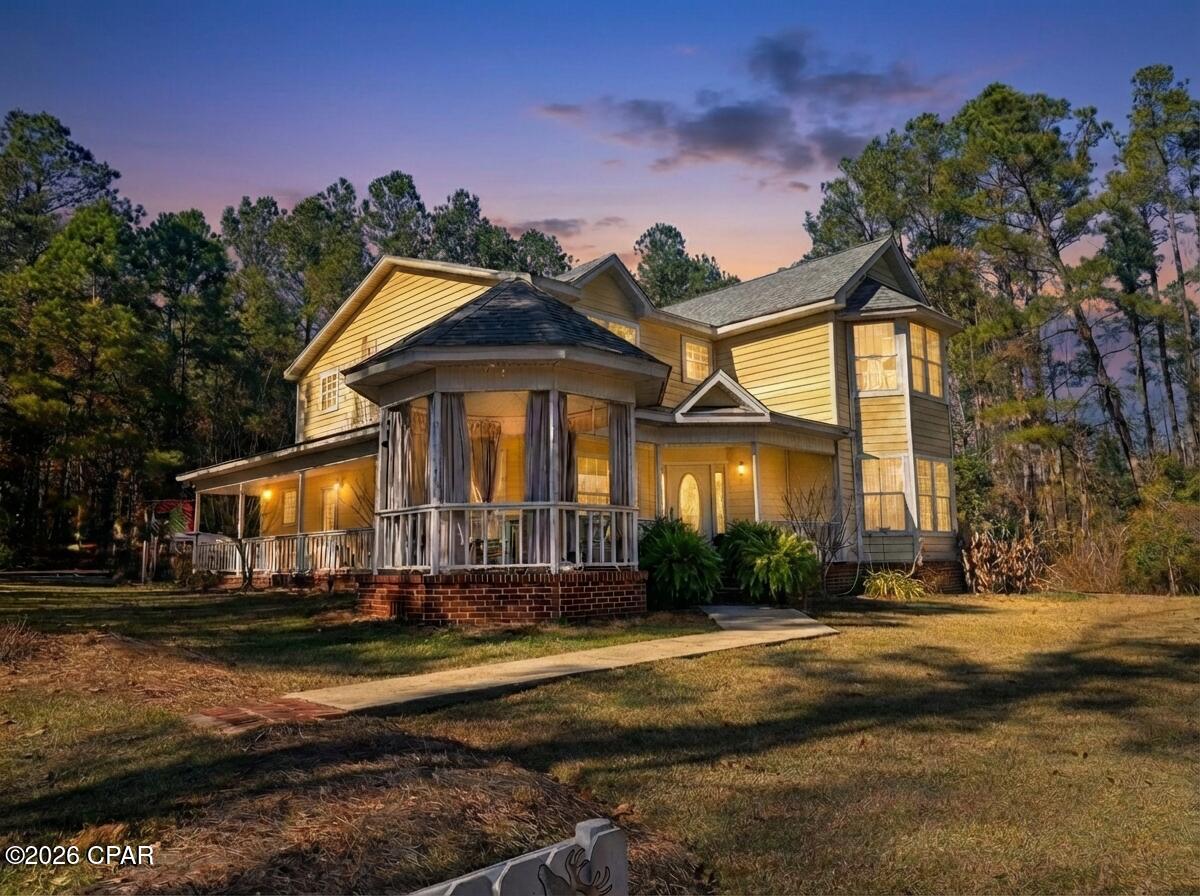 Storybook Victorian on 2 Acres with Wrap Around Porch & Dual Gazebos Minutes from Downtown Marianna!

This is the space and location you've been waiting for. Nestled on 2 picturesque acres just minutes from downtown Marianna, this stunning VICTORIAN-STYLE HOME is a true showstopper. From the moment you arrive, the WRAP AROUND PORCHES WITH TWO ATTACHED GAZEBOS, and beautifully landscaped grounds charm you; setting the stage for timeless SOUTHERN LIVING.

Inside, the 4-bedroom, 3-bath layout offers generous space and thoughtful design. An additional office or hobby room provides flexibility, while the upstairs landing creates the perfect nook for a play area, reading space, or secondary den. The updated kitchen is both stylish and functional, featuring open sight lines to the living area--ideal for everyday living and entertaining alike.

At the heart of the home, the grand wooden staircase feels steeped in tradition and warmth, a perfect backdrop for seasonal décor, garlands, and cherished family moments. Every corner of this home reflects character, comfort, and craftsmanship.

Enjoy the rare combination of acreage, architectural beauty, and close-to-town convenience--this Victorian gem is truly one of a kind. What a wonderful place to raise a family or fur babies!