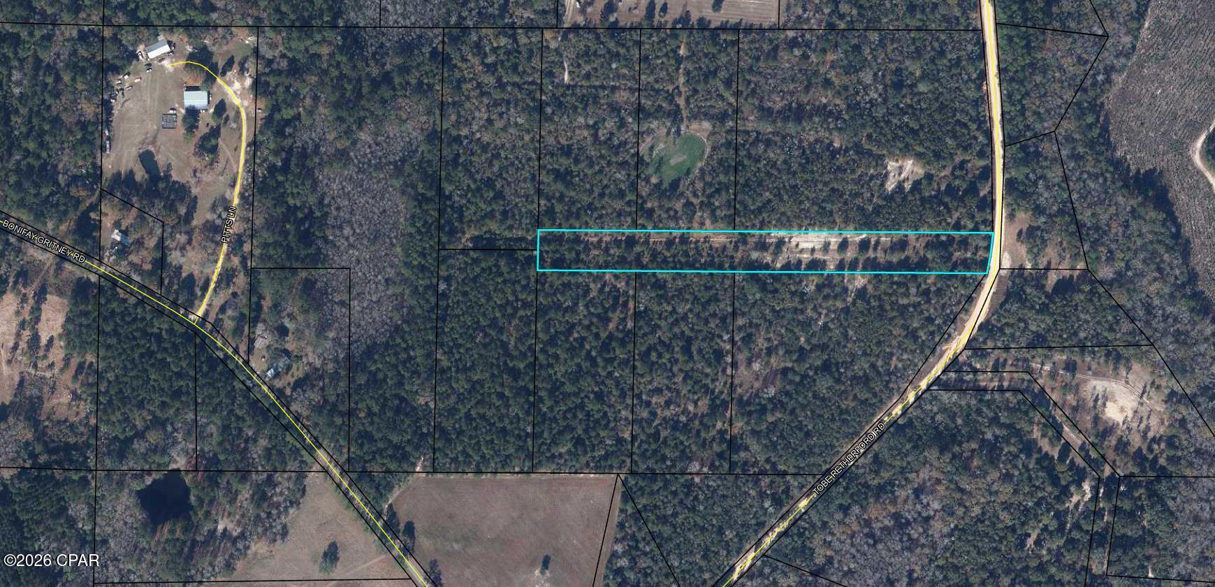 3+- acres of land.  A very unique piece of property that includes a 30 X 885 ft easement for the subdivision of Wrights Creek Farms. but still leaving land for you to use.  Wooded land with frontage on a county paved road. Lots of possibilities. Short distance to town and only 45 minutes to Panama City Beach with the world's most beautiful white sandy beaches. Buyer will have to pay for a survey. Check it out today!!!!