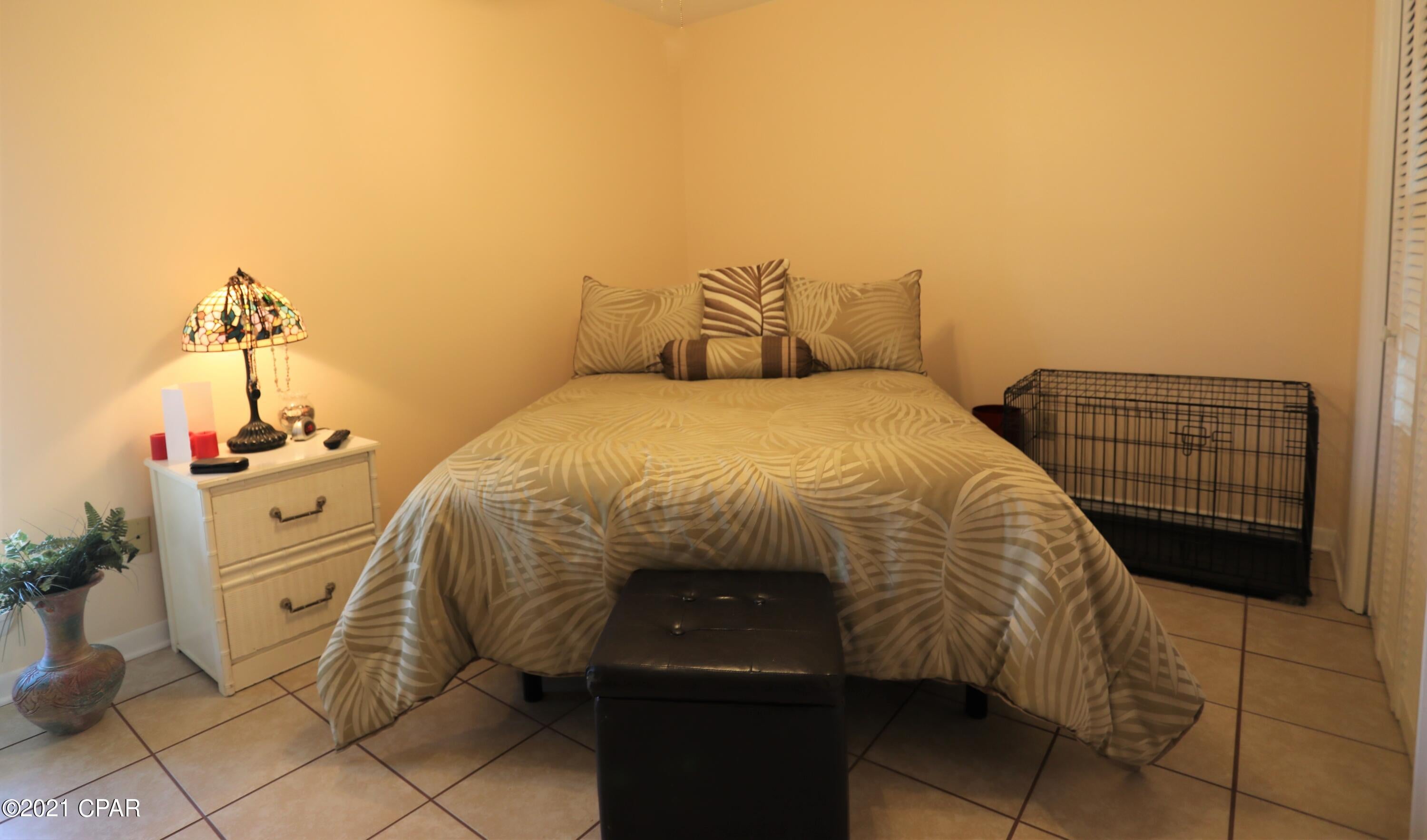 Location! Location! Don't miss out on this great unit! This unit is tenant rented and is across the street from some of the most beautiful beaches in the world on the west end of PCB. This unit is well maintained and has been beautifully decorated with a galley style kitchen and butcher block breakfast bar. The bedroom is a great size with plenty of closet space. This unit has a washer and dryer. This ground level unit is overlooking the pools and common area and is ready for you to make it your own.